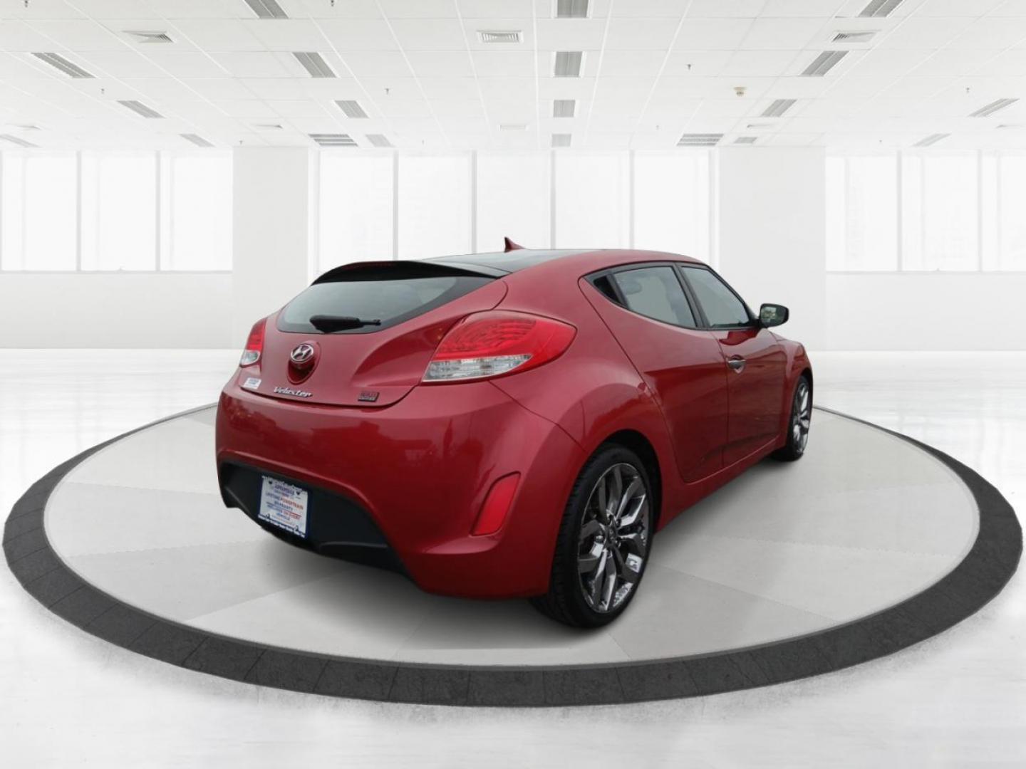 2015 Boston Red Metallic Hyundai Veloster Base 6MT (KMHTC6AD1FU) with an 1.6L L4 DOHC 16V engine, 6-Speed Manual transmission, located at 1099 N County Rd 25A , Troy, OH, 45373, (937) 908-9800, 40.057079, -84.212883 - Photo#2