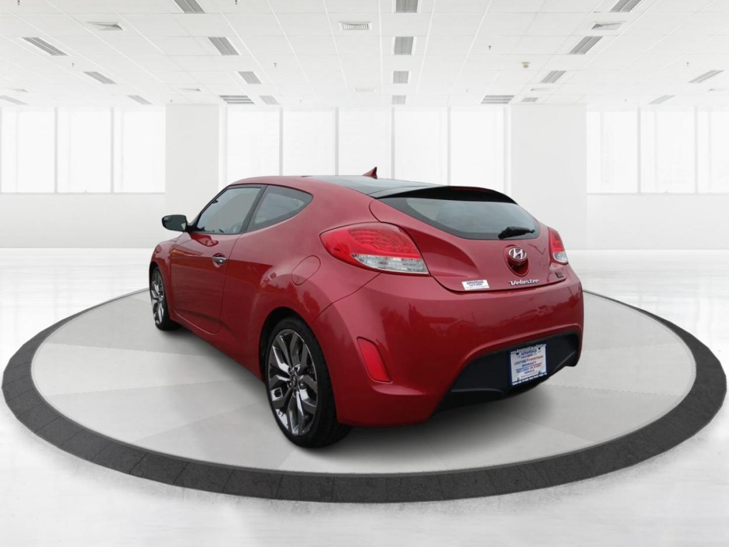 2015 Boston Red Metallic Hyundai Veloster Base 6MT (KMHTC6AD1FU) with an 1.6L L4 DOHC 16V engine, 6-Speed Manual transmission, located at 1099 N County Rd 25A , Troy, OH, 45373, (937) 908-9800, 40.057079, -84.212883 - Photo#4