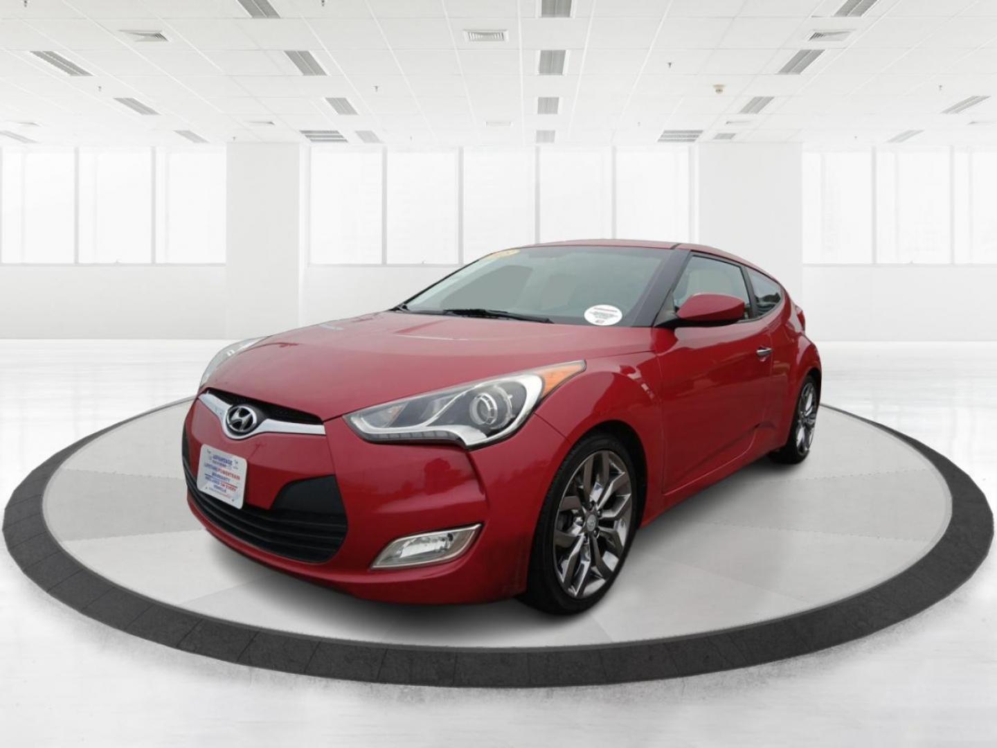 2015 Boston Red Metallic Hyundai Veloster Base 6MT (KMHTC6AD1FU) with an 1.6L L4 DOHC 16V engine, 6-Speed Manual transmission, located at 1099 N County Rd 25A , Troy, OH, 45373, (937) 908-9800, 40.057079, -84.212883 - Photo#7