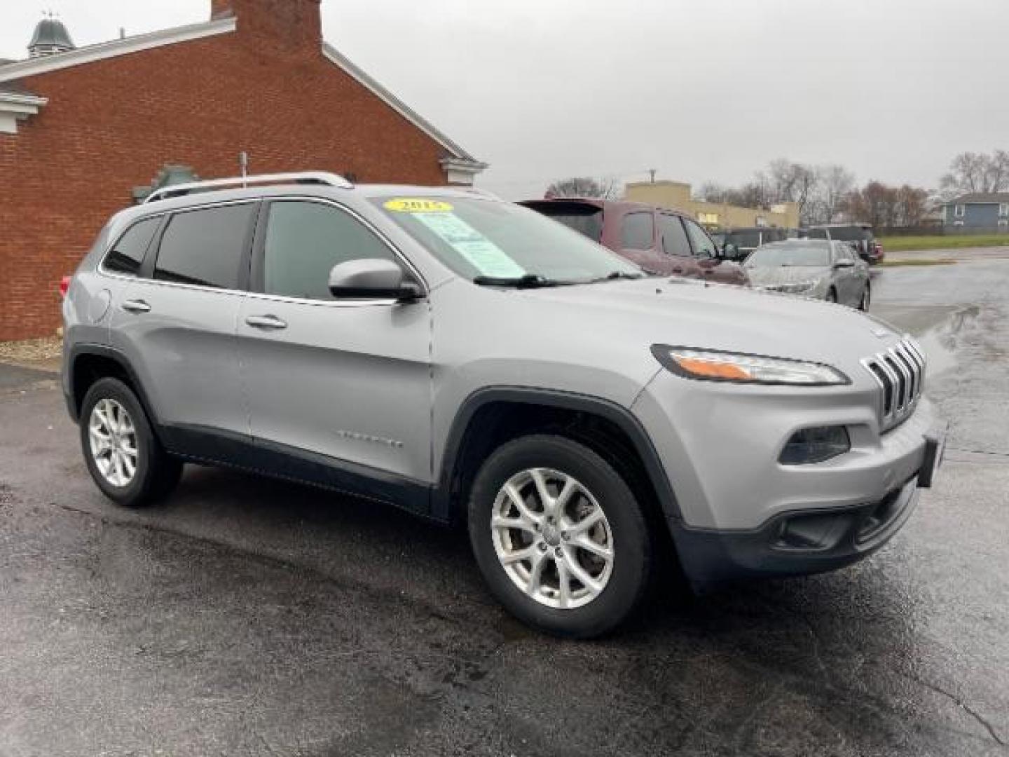 2015 Billet Silver Metallic CC Jeep Cherokee Latitude 4WD (1C4PJMCBXFW) with an 2.4L L4 DOHC 16V engine, 9-Speed Automatic transmission, located at 1099 N County Rd 25A , Troy, OH, 45373, (937) 908-9800, 40.057079, -84.212883 - Photo#0