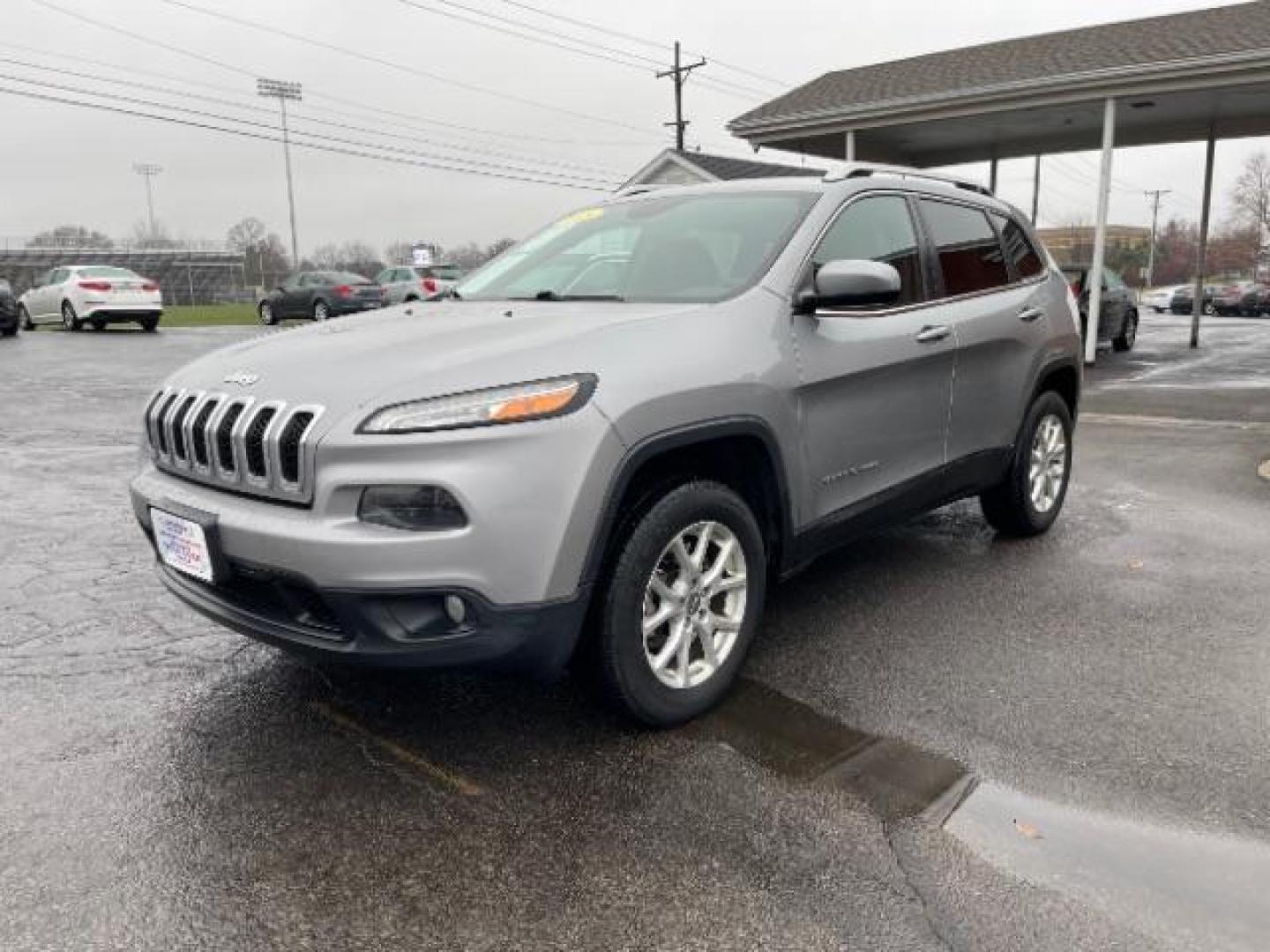 2015 Billet Silver Metallic CC Jeep Cherokee Latitude 4WD (1C4PJMCBXFW) with an 2.4L L4 DOHC 16V engine, 9-Speed Automatic transmission, located at 1099 N County Rd 25A , Troy, OH, 45373, (937) 908-9800, 40.057079, -84.212883 - Photo#1