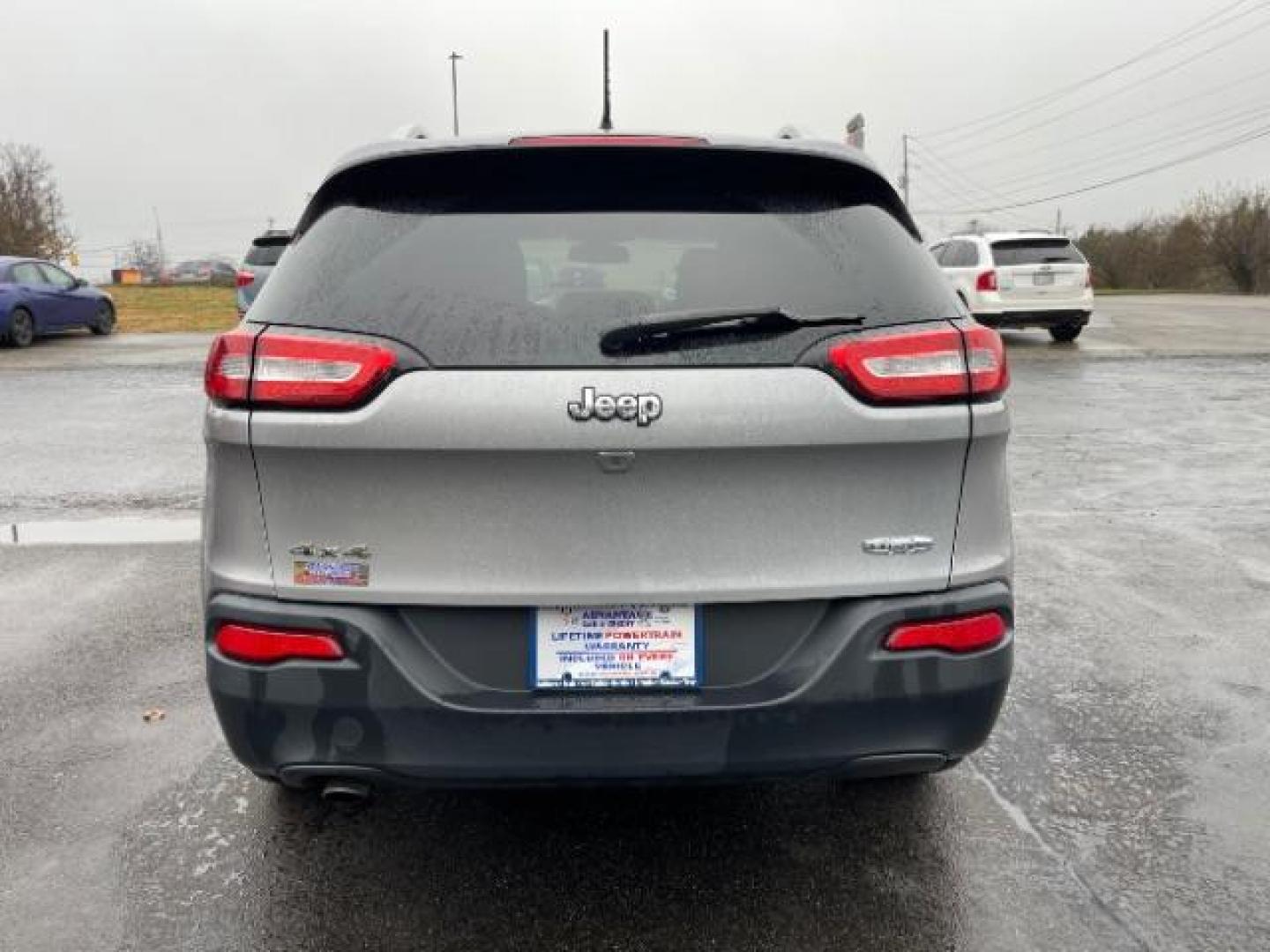 2015 Billet Silver Metallic CC Jeep Cherokee Latitude 4WD (1C4PJMCBXFW) with an 2.4L L4 DOHC 16V engine, 9-Speed Automatic transmission, located at 1099 N County Rd 25A , Troy, OH, 45373, (937) 908-9800, 40.057079, -84.212883 - Photo#4