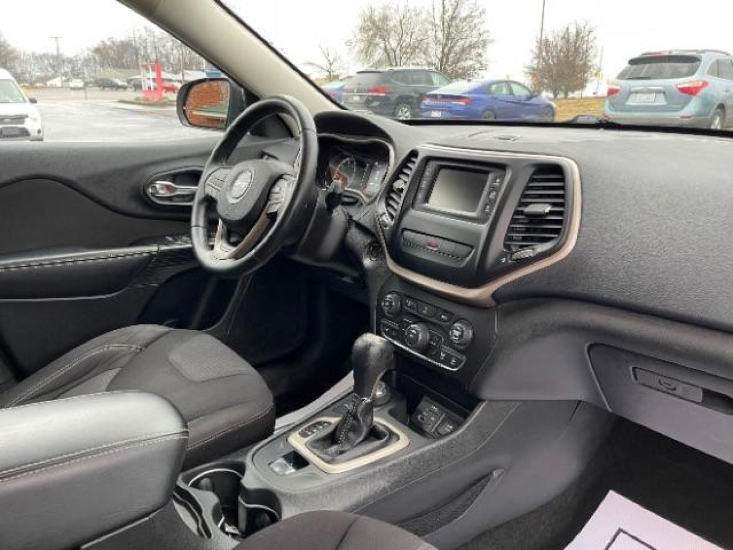 2015 Billet Silver Metallic CC Jeep Cherokee Latitude 4WD (1C4PJMCBXFW) with an 2.4L L4 DOHC 16V engine, 9-Speed Automatic transmission, located at 1099 N County Rd 25A , Troy, OH, 45373, (937) 908-9800, 40.057079, -84.212883 - Photo#7