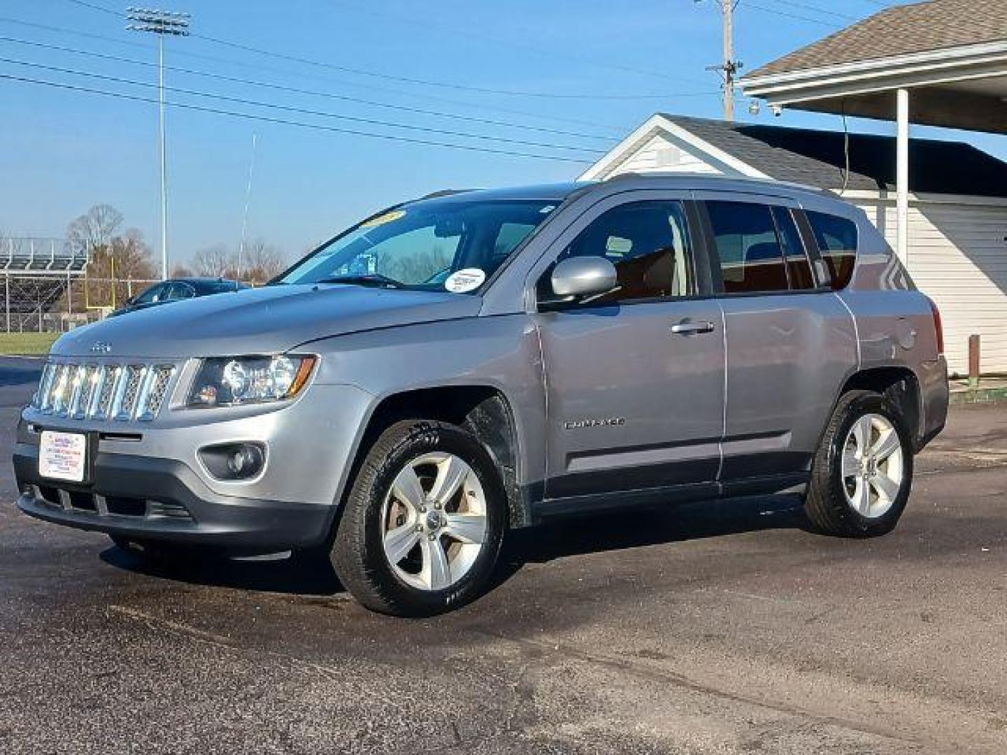 2015 Billet Silver Metallic Clear Coat Jeep Compass Latitude 4WD (1C4NJDEB0FD) with an 2.4L L4 DOHC 16V engine, 6-Speed Automatic transmission, located at 1184 Kauffman Ave, Fairborn, OH, 45324, (937) 908-9800, 39.807072, -84.030914 - Photo#2