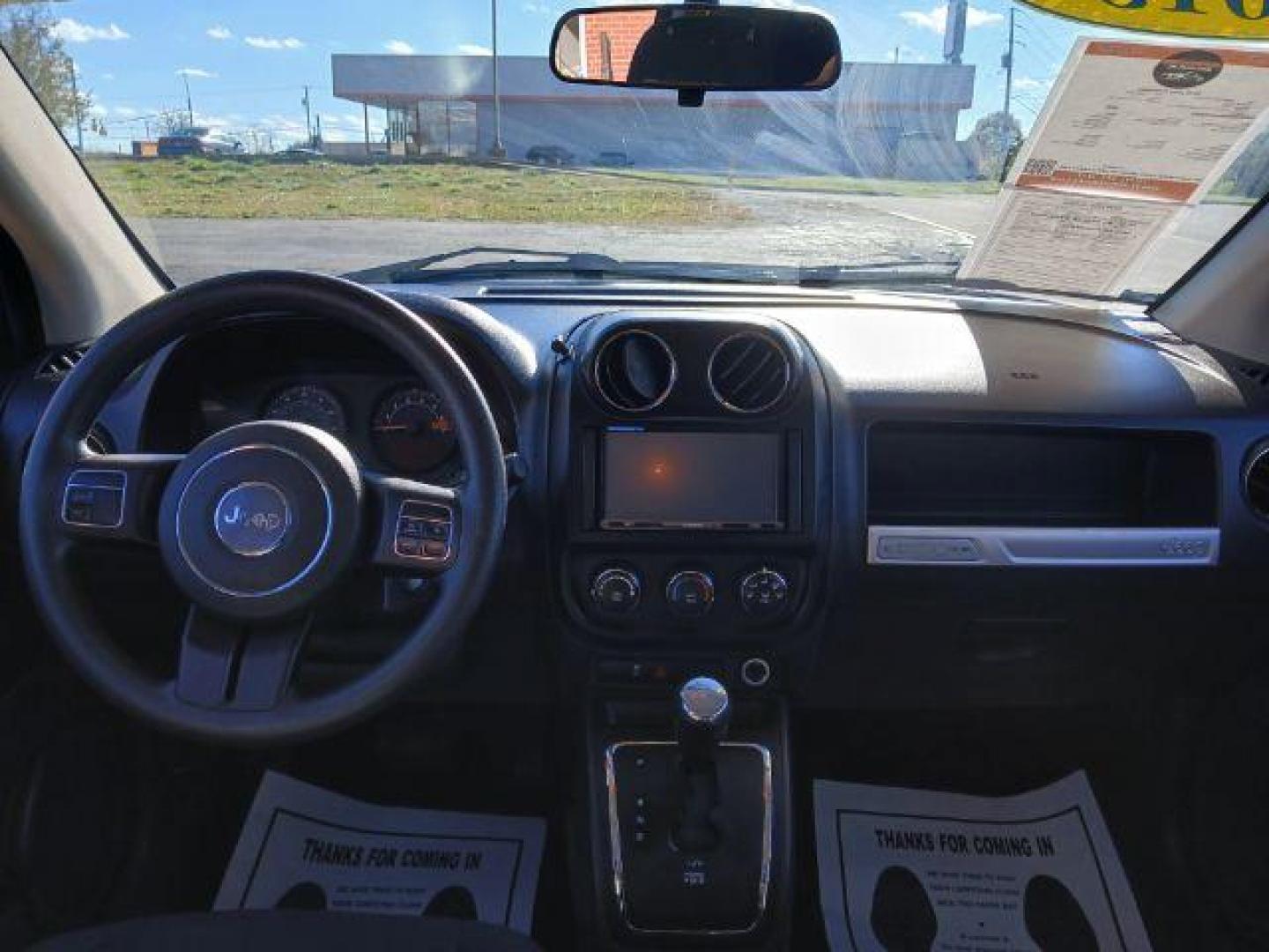 2015 Granite Crystal Metallic Clear Coat Jeep Compass Sport FWD (1C4NJCBA1FD) with an 2.0L L4 DOHC 16V engine, located at 1951 S Dayton Lakeview Rd., New Carlisle, OH, 45344, (937) 908-9800, 39.890999, -84.050255 - 2015 Jeep Compass Sport FWD - Photo#26