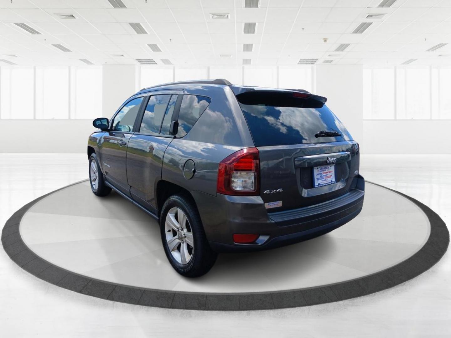 2015 Granite Crystal Metallic Clear Coat Jeep Compass (1C4NJDEB4FD) with an 2.4L L4 DOHC 16V engine, 6-Speed Automatic transmission, located at 1099 N County Rd 25A , Troy, OH, 45373, (937) 908-9800, 40.057079, -84.212883 - Photo#4