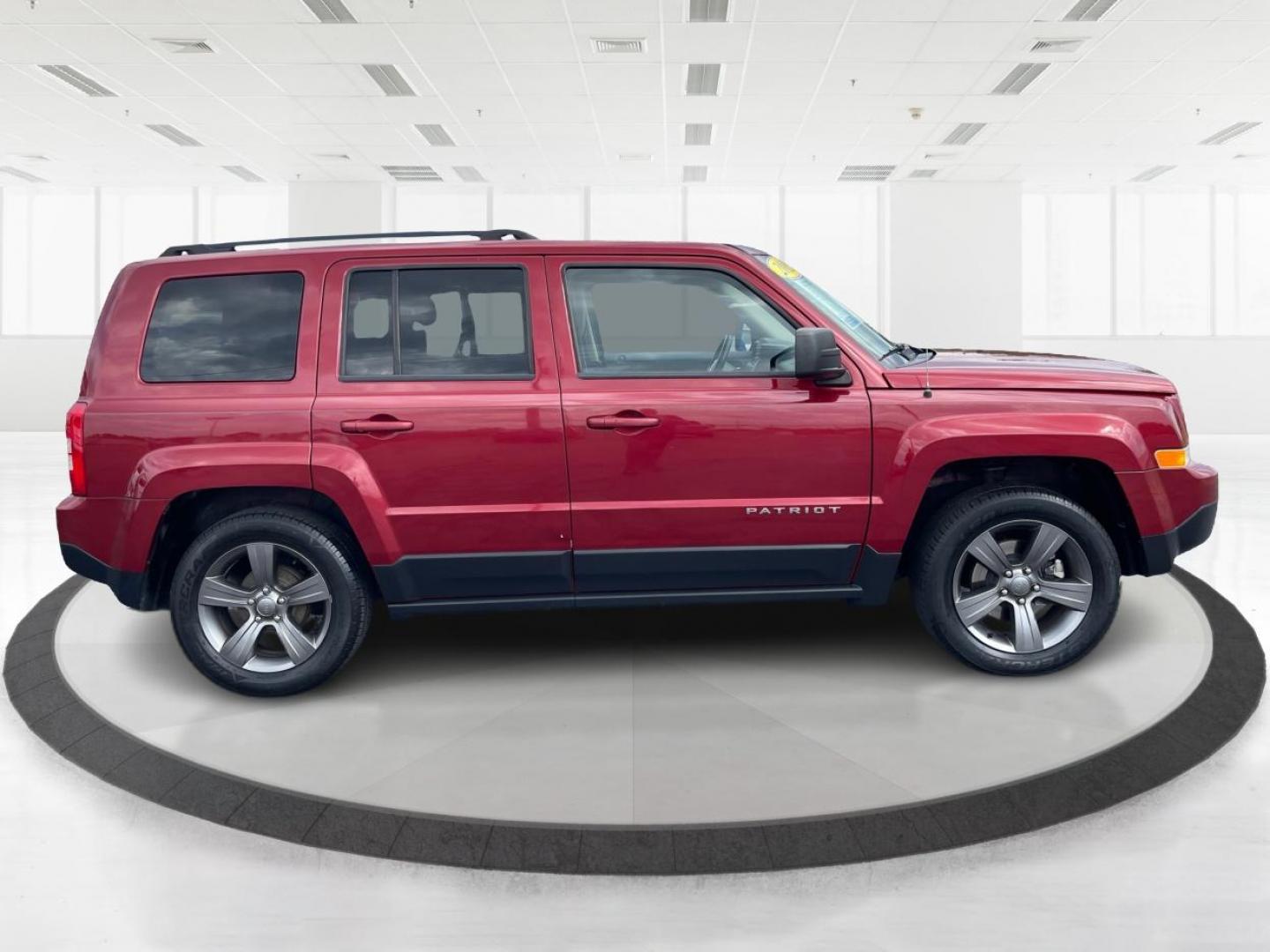 2015 Dp Cherry Red Crystal PC Jeep Patriot Latitude 2WD (1C4NJPFA1FD) with an 2.0L L4 DOHC 16V engine, located at 1184 Kauffman Ave, Fairborn, OH, 45324, (937) 908-9800, 39.807072, -84.030914 - Photo#1