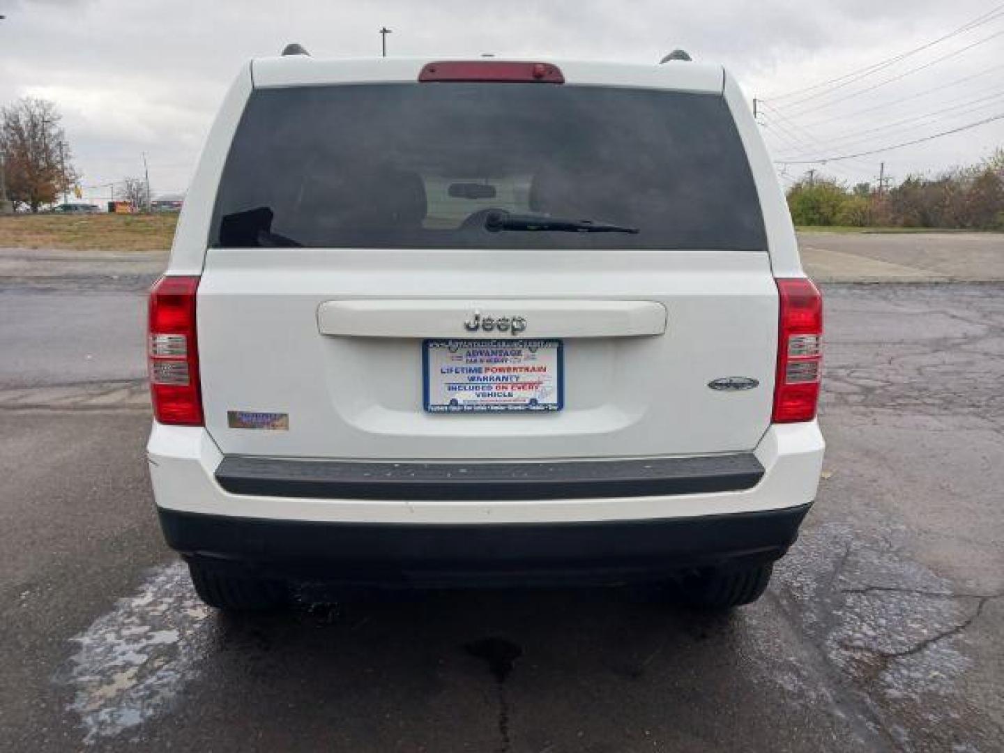 2015 Bright White Clearcoat Jeep Patriot Latitude 2WD (1C4NJPFA8FD) with an 2.0L L4 DOHC 16V engine, located at 4508 South Dixie Dr, Moraine, OH, 45439, (937) 908-9800, 39.689976, -84.218452 - Photo#5