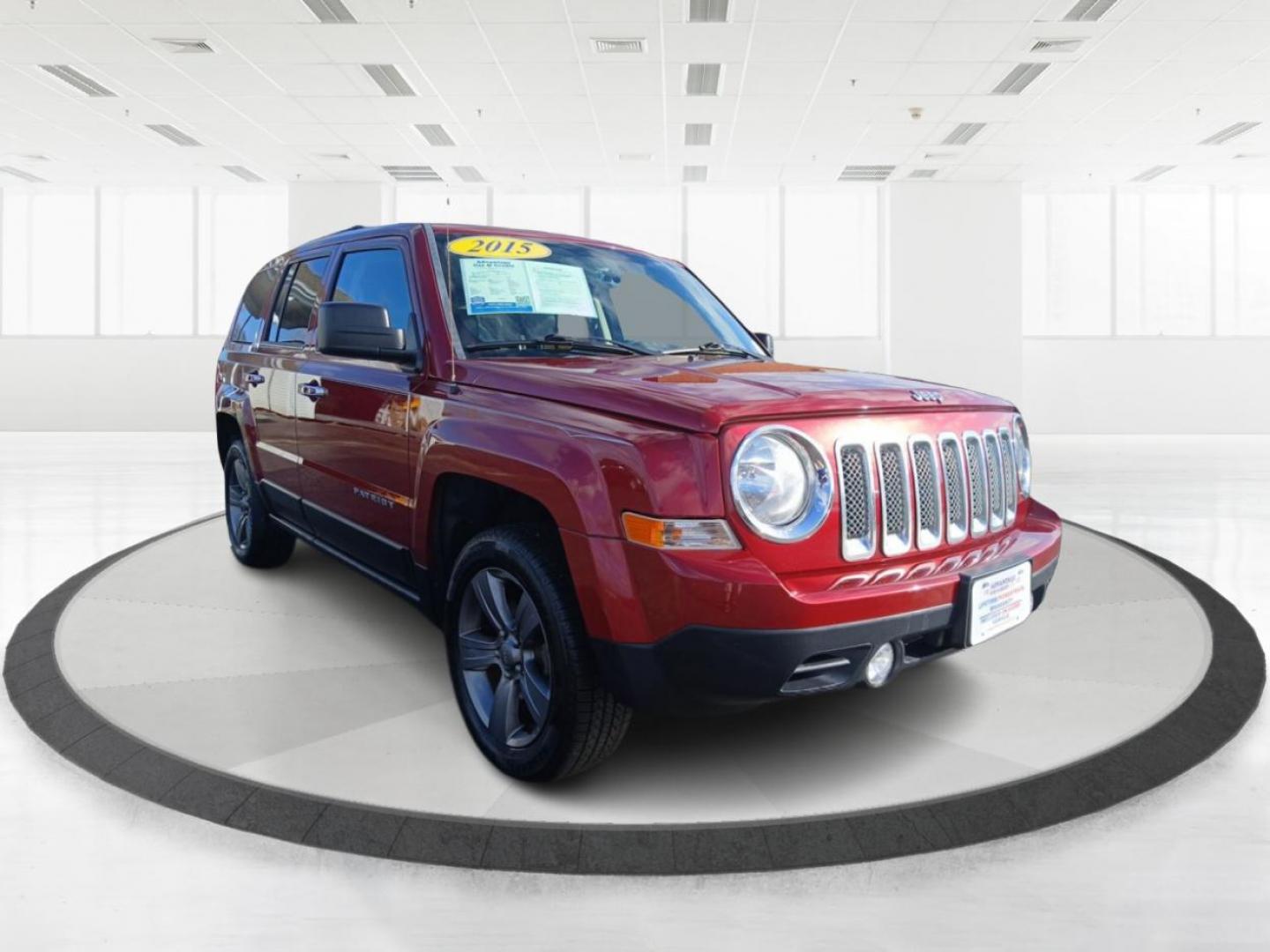 2015 Dp Cherry Red Crystal PC Jeep Patriot Latitude 4WD (1C4NJRFB8FD) with an 2.4L L4 DOHC 16V engine, located at 8750 N County Rd 25A, Piqua, OH, 45356, (937) 908-9800, 40.164391, -84.232513 - Photo#0