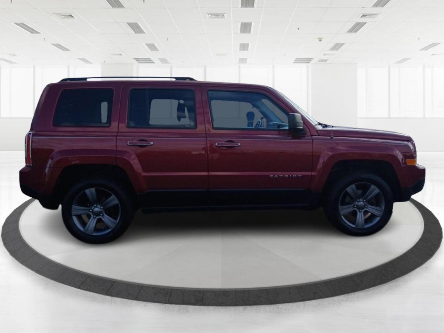 2015 Dp Cherry Red Crystal PC Jeep Patriot Latitude 4WD (1C4NJRFB8FD) with an 2.4L L4 DOHC 16V engine, located at 8750 N County Rd 25A, Piqua, OH, 45356, (937) 908-9800, 40.164391, -84.232513 - Photo#1