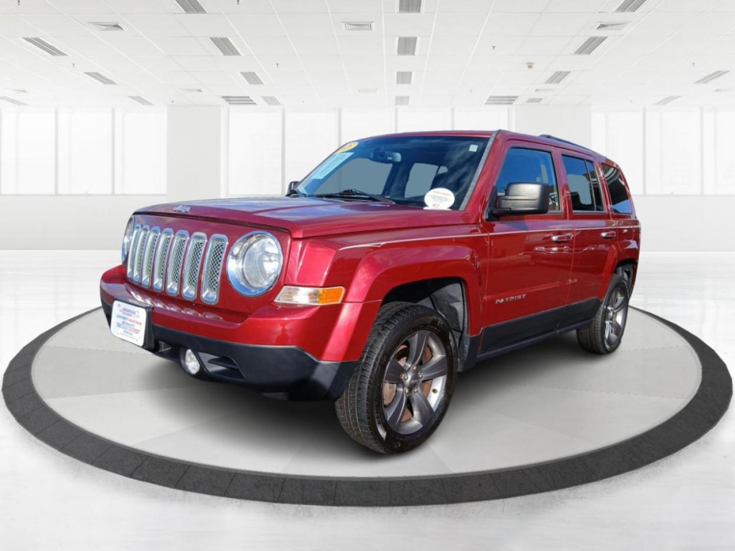 2015 Dp Cherry Red Crystal PC Jeep Patriot Latitude 4WD (1C4NJRFB8FD) with an 2.4L L4 DOHC 16V engine, located at 8750 N County Rd 25A, Piqua, OH, 45356, (937) 908-9800, 40.164391, -84.232513 - Photo#7