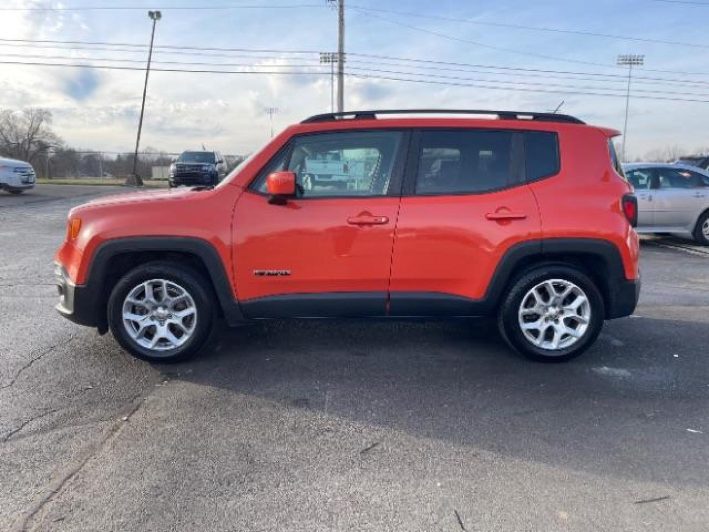 2015 Omaha Orange Jeep Renegade Latitude FWD (ZACCJABT6FP) with an 2.4L L4 DOHC 16V engine, 6-Speed Manual transmission, located at 1184 Kauffman Ave, Fairborn, OH, 45324, (937) 908-9800, 39.807072, -84.030914 - Photo#4