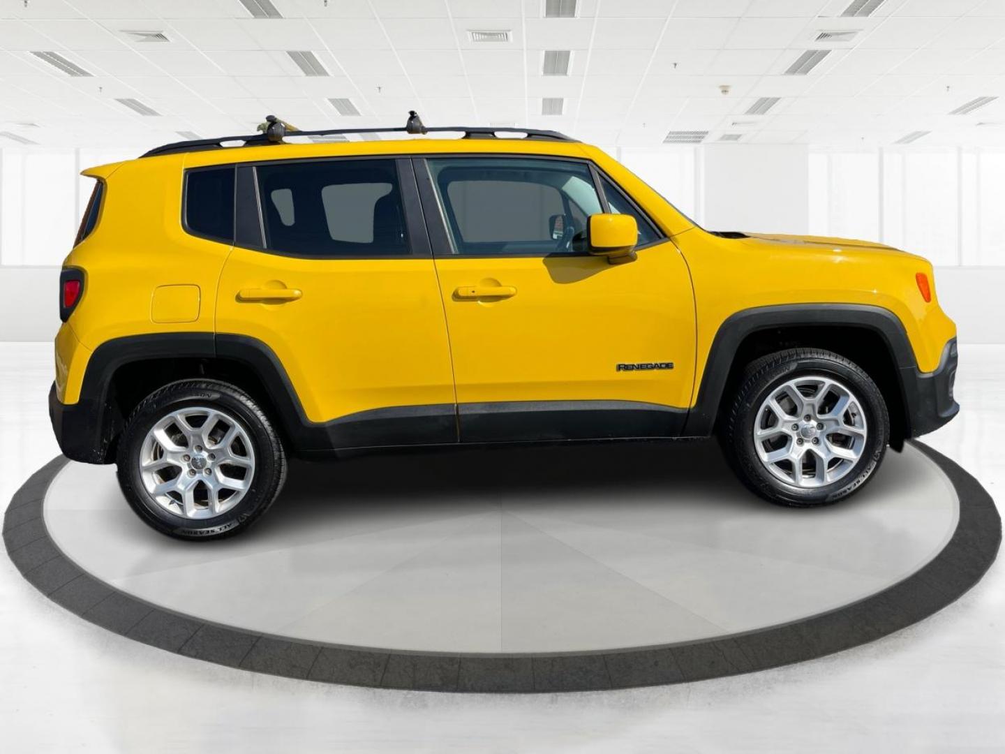 2015 Solar Yellow Jeep Renegade Latitude 4WD (ZACCJBBT3FP) with an 2.4L L4 engine, 6-Speed Manual transmission, located at 1184 Kauffman Ave, Fairborn, OH, 45324, (937) 908-9800, 39.807072, -84.030914 - Photo#1