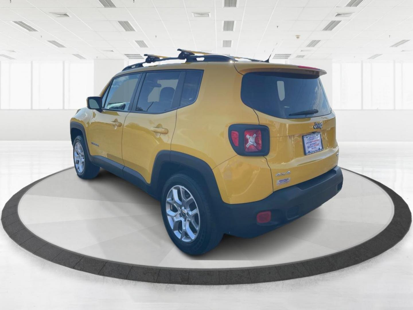 2015 Solar Yellow Jeep Renegade Latitude 4WD (ZACCJBBT3FP) with an 2.4L L4 engine, 6-Speed Manual transmission, located at 1184 Kauffman Ave, Fairborn, OH, 45324, (937) 908-9800, 39.807072, -84.030914 - Photo#4