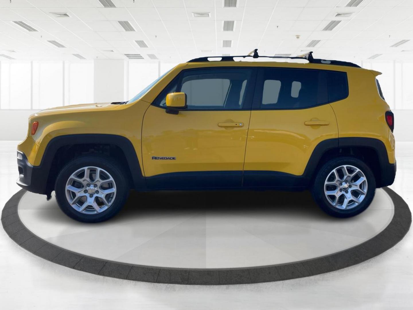 2015 Solar Yellow Jeep Renegade Latitude 4WD (ZACCJBBT3FP) with an 2.4L L4 engine, 6-Speed Manual transmission, located at 1184 Kauffman Ave, Fairborn, OH, 45324, (937) 908-9800, 39.807072, -84.030914 - Photo#5