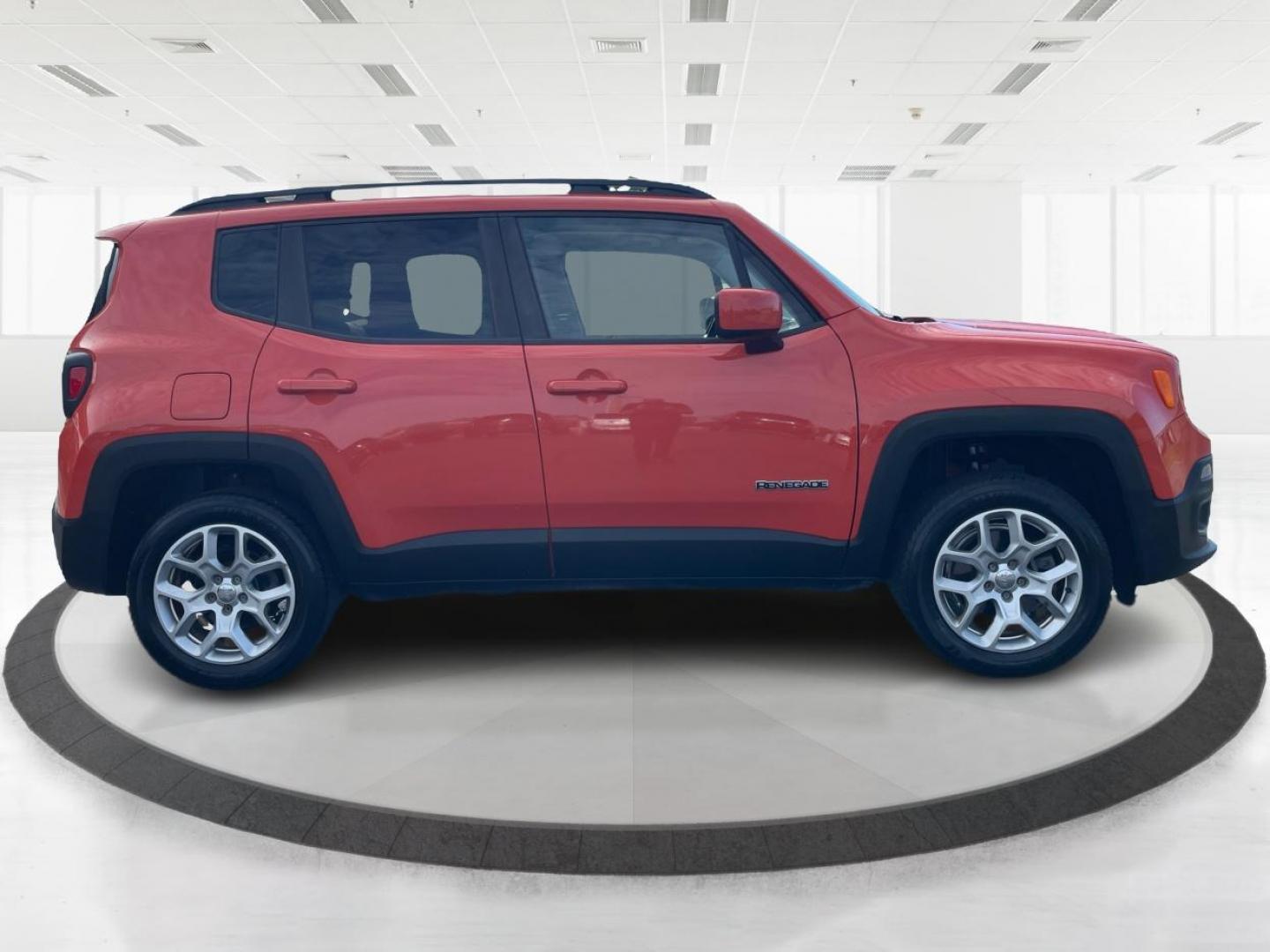 2015 Omaha Orange Jeep Renegade Latitude 4WD (ZACCJBBT2FP) with an 2.4L L4 engine, 6-Speed Manual transmission, located at 1230 East Main St, Xenia, OH, 45385, (937) 908-9800, 39.688026, -83.910172 - Photo#1