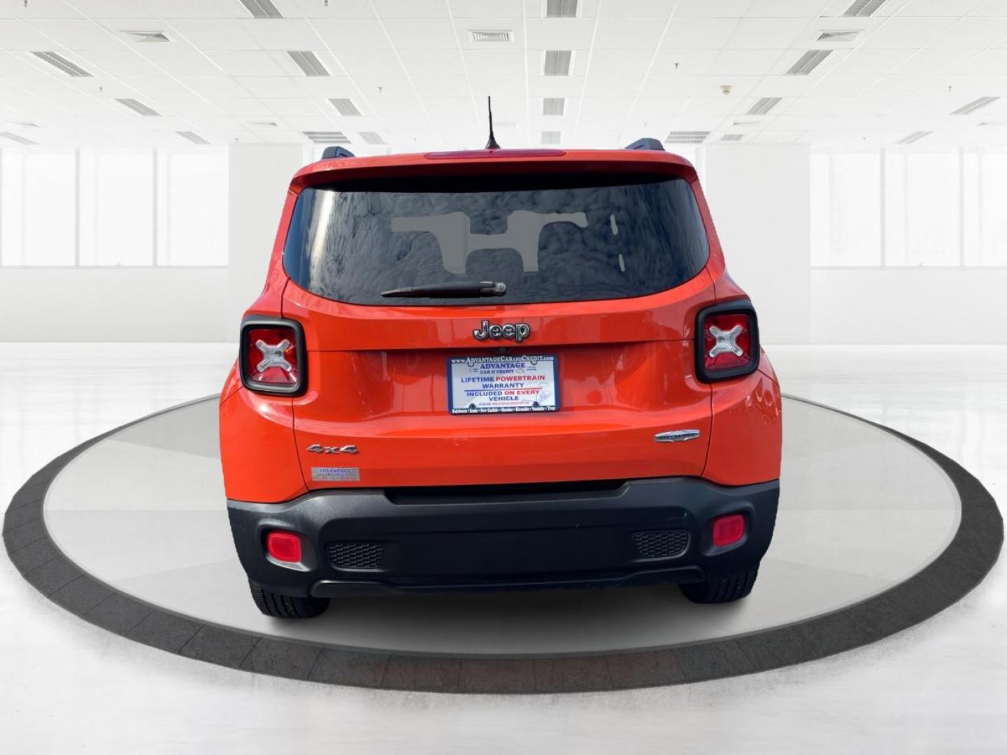 2015 Omaha Orange Jeep Renegade Latitude 4WD (ZACCJBBT2FP) with an 2.4L L4 engine, 6-Speed Manual transmission, located at 1230 East Main St, Xenia, OH, 45385, (937) 908-9800, 39.688026, -83.910172 - Photo#3