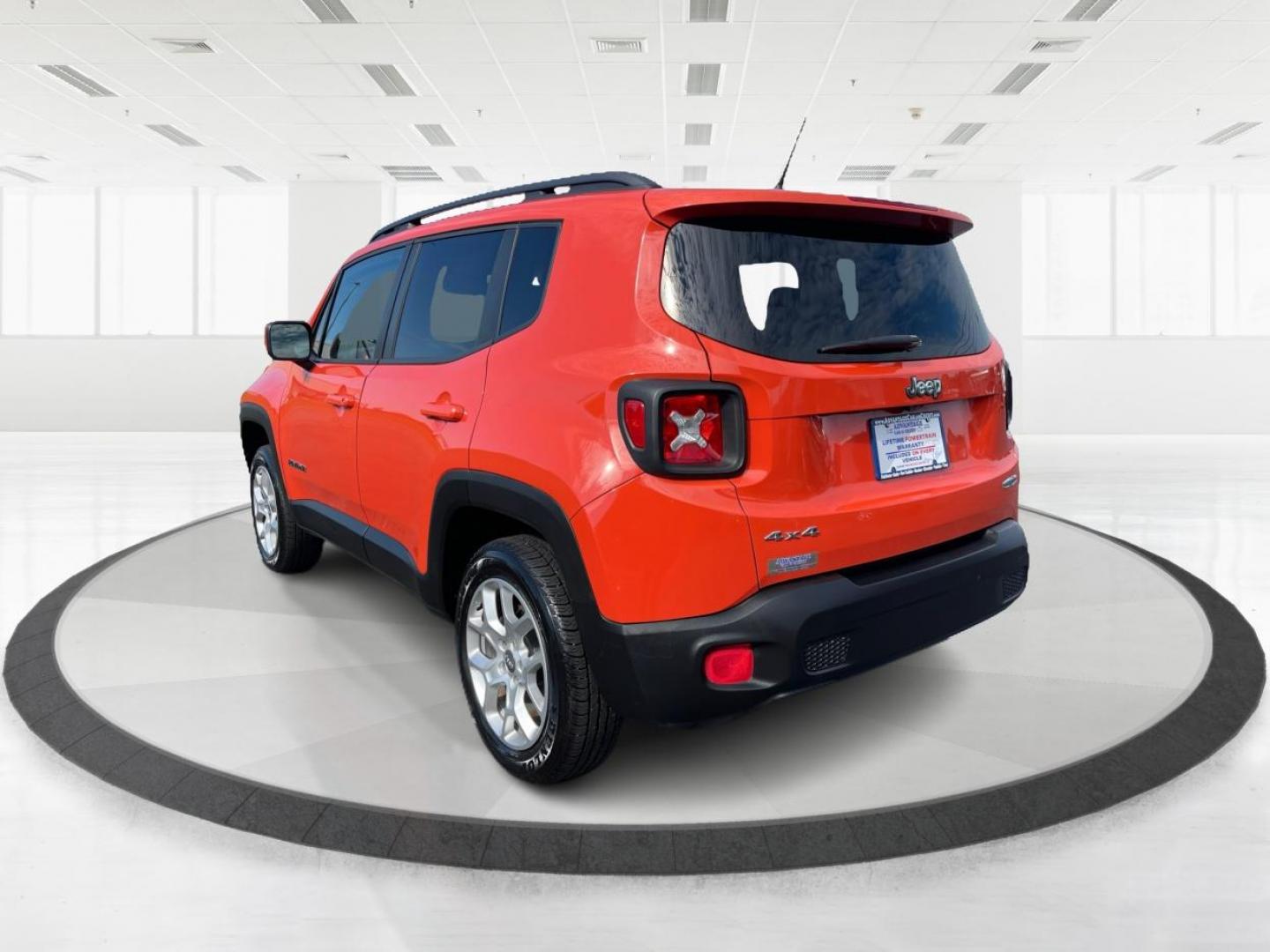 2015 Omaha Orange Jeep Renegade Latitude 4WD (ZACCJBBT2FP) with an 2.4L L4 engine, 6-Speed Manual transmission, located at 1230 East Main St, Xenia, OH, 45385, (937) 908-9800, 39.688026, -83.910172 - Photo#4