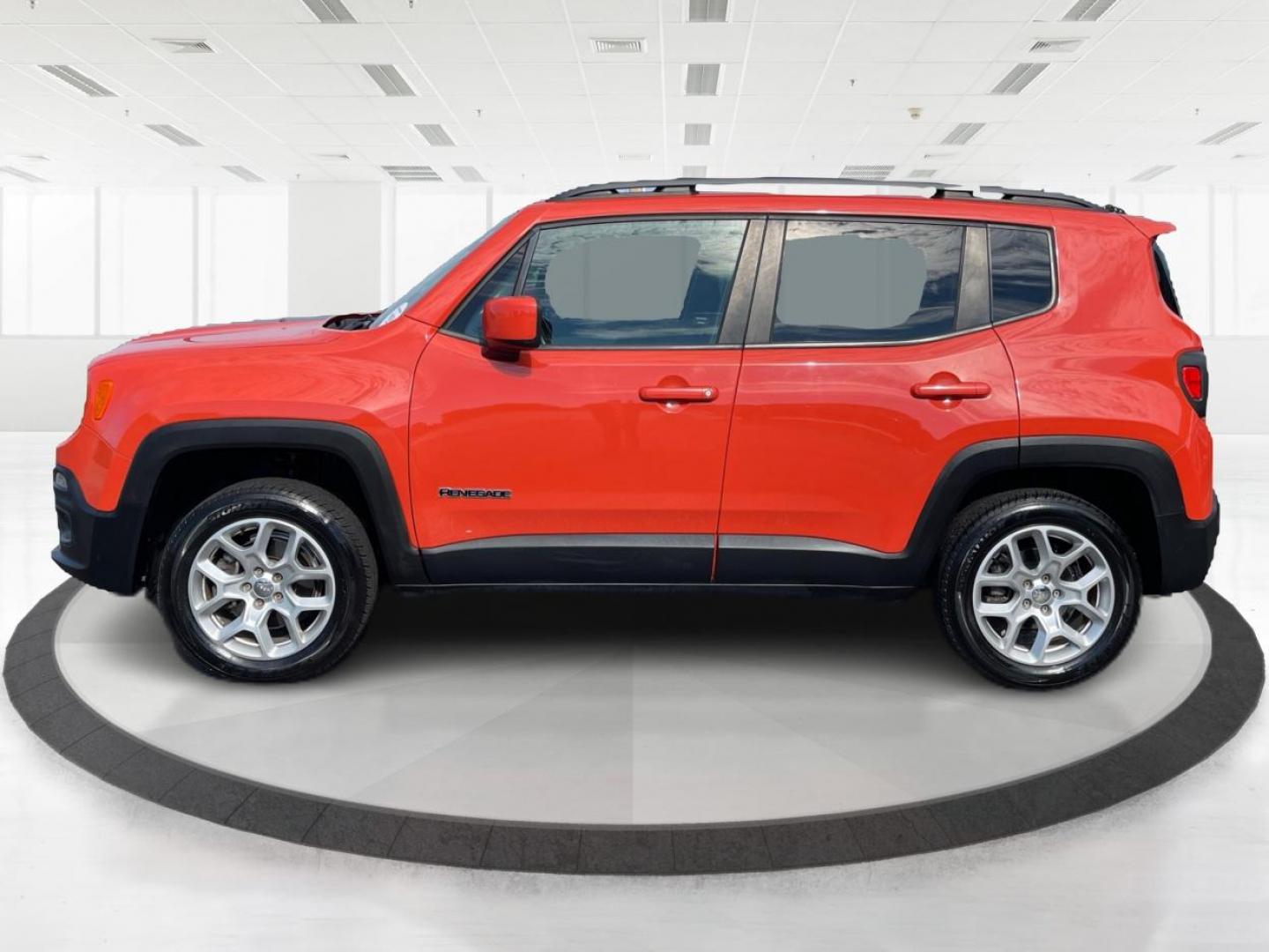 2015 Omaha Orange Jeep Renegade Latitude 4WD (ZACCJBBT2FP) with an 2.4L L4 engine, 6-Speed Manual transmission, located at 1230 East Main St, Xenia, OH, 45385, (937) 908-9800, 39.688026, -83.910172 - Photo#5