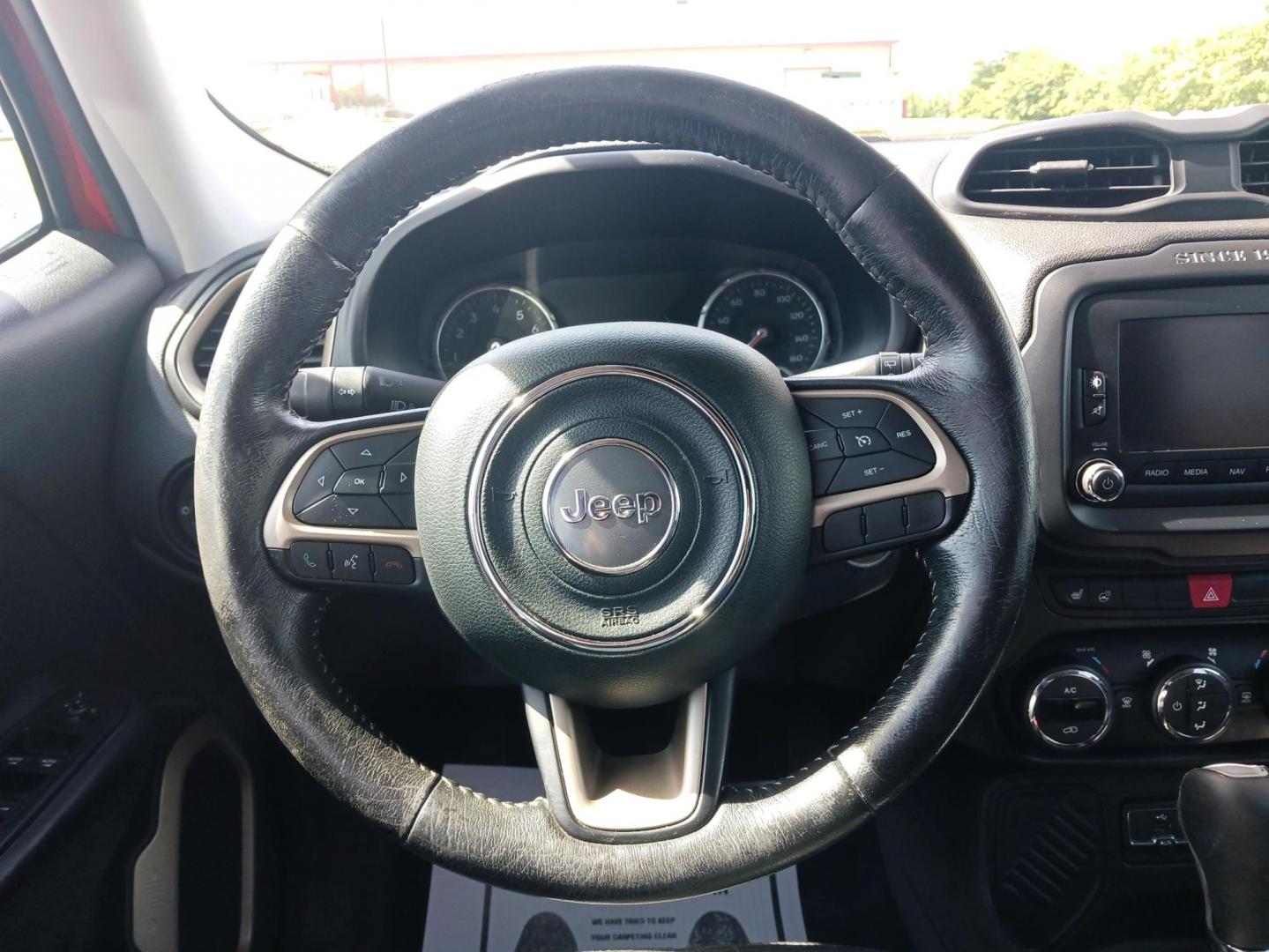 2015 Colorado Red Jeep Renegade Limited FWD (ZACCJADT0FP) with an 2.4L L4 engine, 9-Speed Automatic transmission, located at 880 E. National Road, Vandalia, OH, 45377, (937) 908-9800, 39.891918, -84.183594 - Photo#15