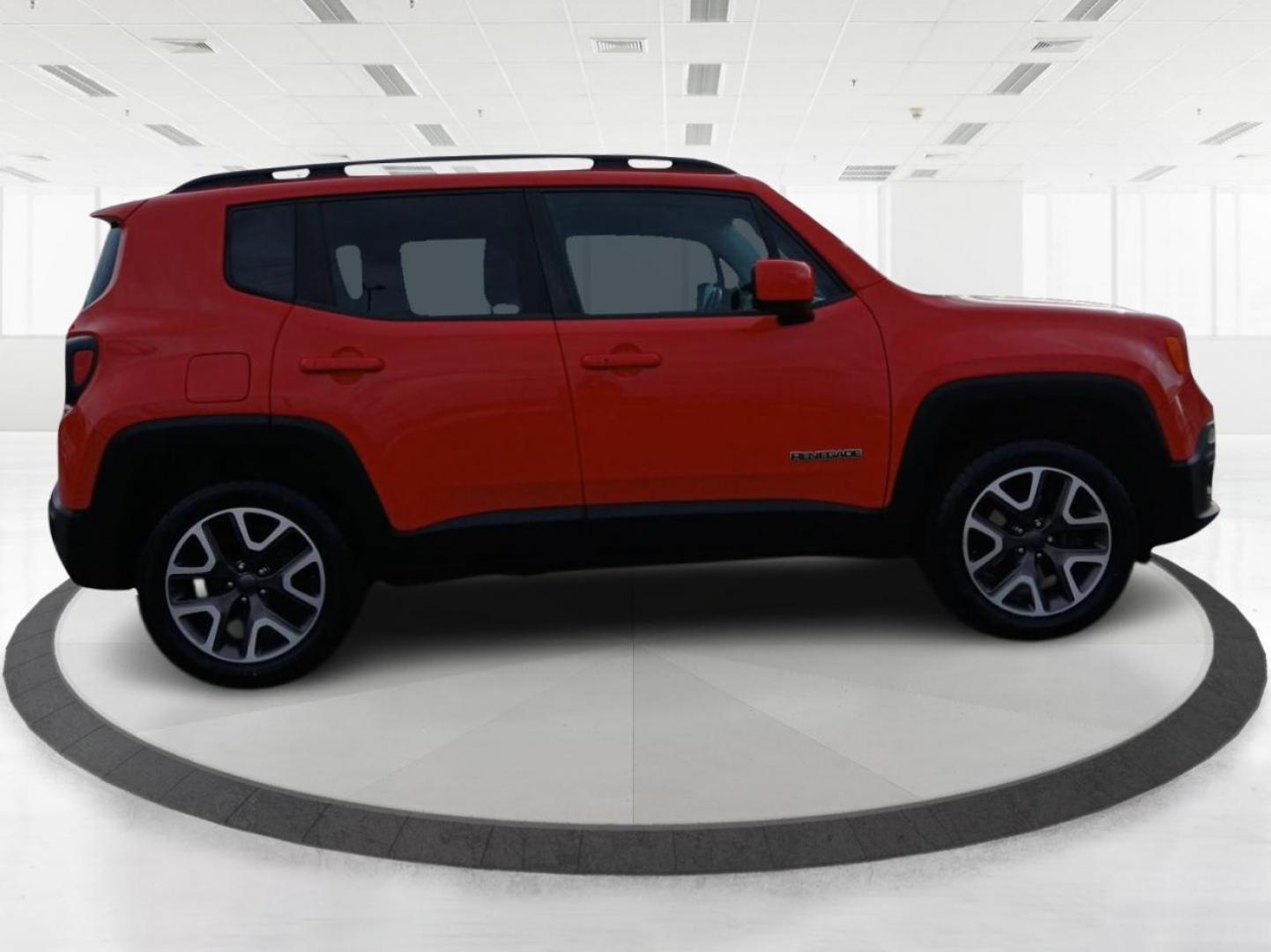 2015 Colorado Red Jeep Renegade Latitude 4WD (ZACCJBBT2FP) with an 2.4L L4 engine, 6-Speed Manual transmission, located at 8750 N County Rd 25A, Piqua, OH, 45356, (937) 908-9800, 40.164391, -84.232513 - Photo#1