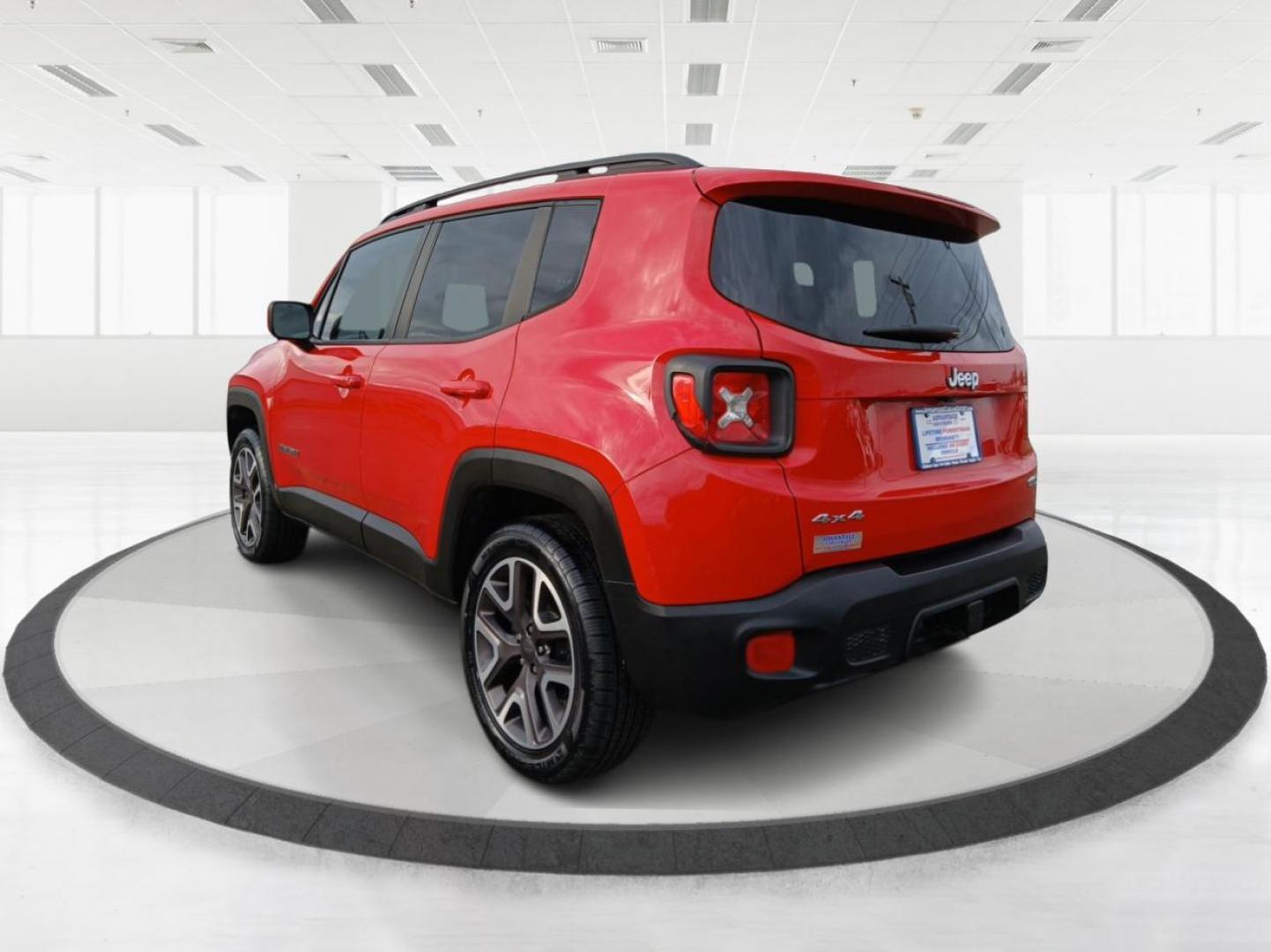 2015 Colorado Red Jeep Renegade Latitude 4WD (ZACCJBBT2FP) with an 2.4L L4 engine, 6-Speed Manual transmission, located at 8750 N County Rd 25A, Piqua, OH, 45356, (937) 908-9800, 40.164391, -84.232513 - Photo#4