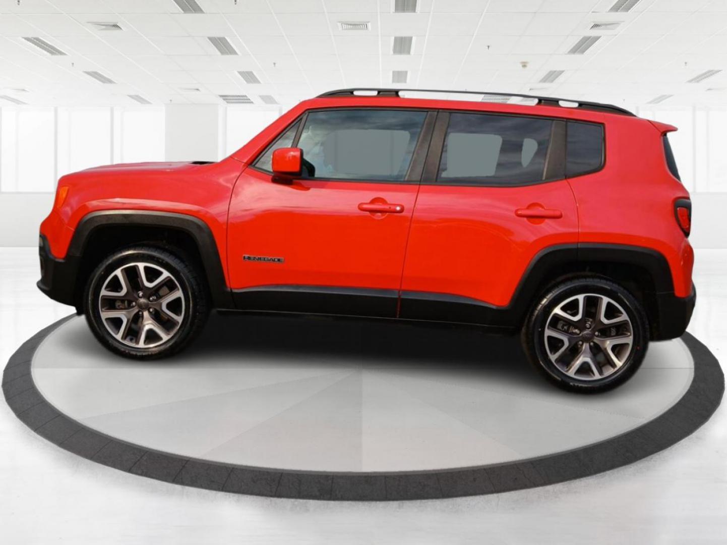 2015 Colorado Red Jeep Renegade Latitude 4WD (ZACCJBBT2FP) with an 2.4L L4 engine, 6-Speed Manual transmission, located at 8750 N County Rd 25A, Piqua, OH, 45356, (937) 908-9800, 40.164391, -84.232513 - Photo#5