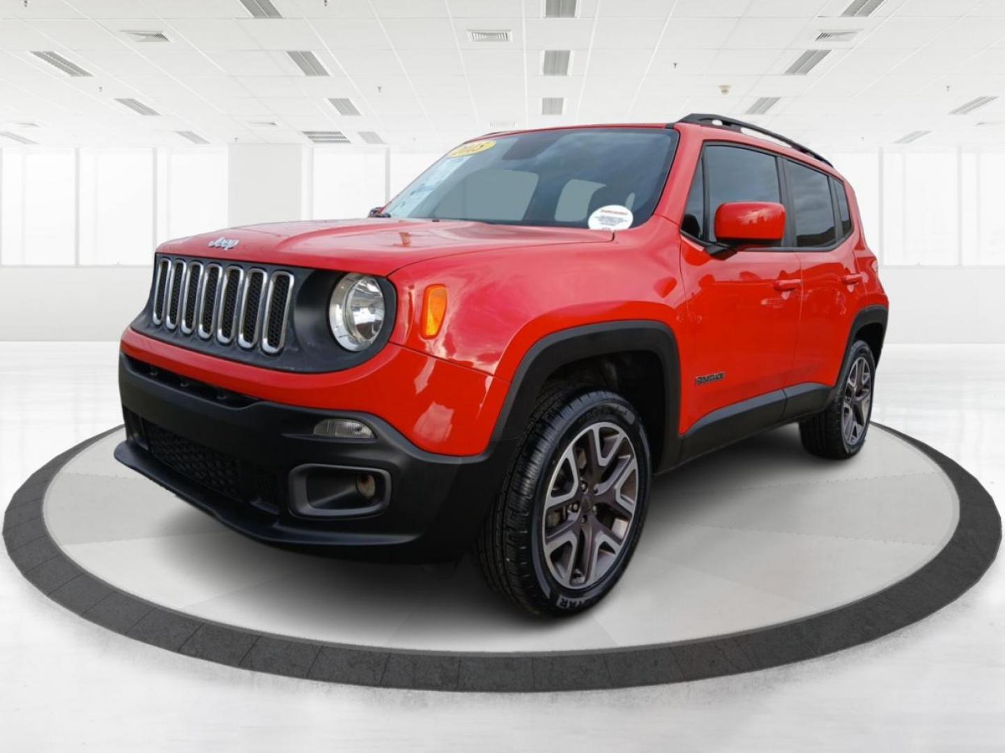 2015 Colorado Red Jeep Renegade Latitude 4WD (ZACCJBBT2FP) with an 2.4L L4 engine, 6-Speed Manual transmission, located at 8750 N County Rd 25A, Piqua, OH, 45356, (937) 908-9800, 40.164391, -84.232513 - Photo#7