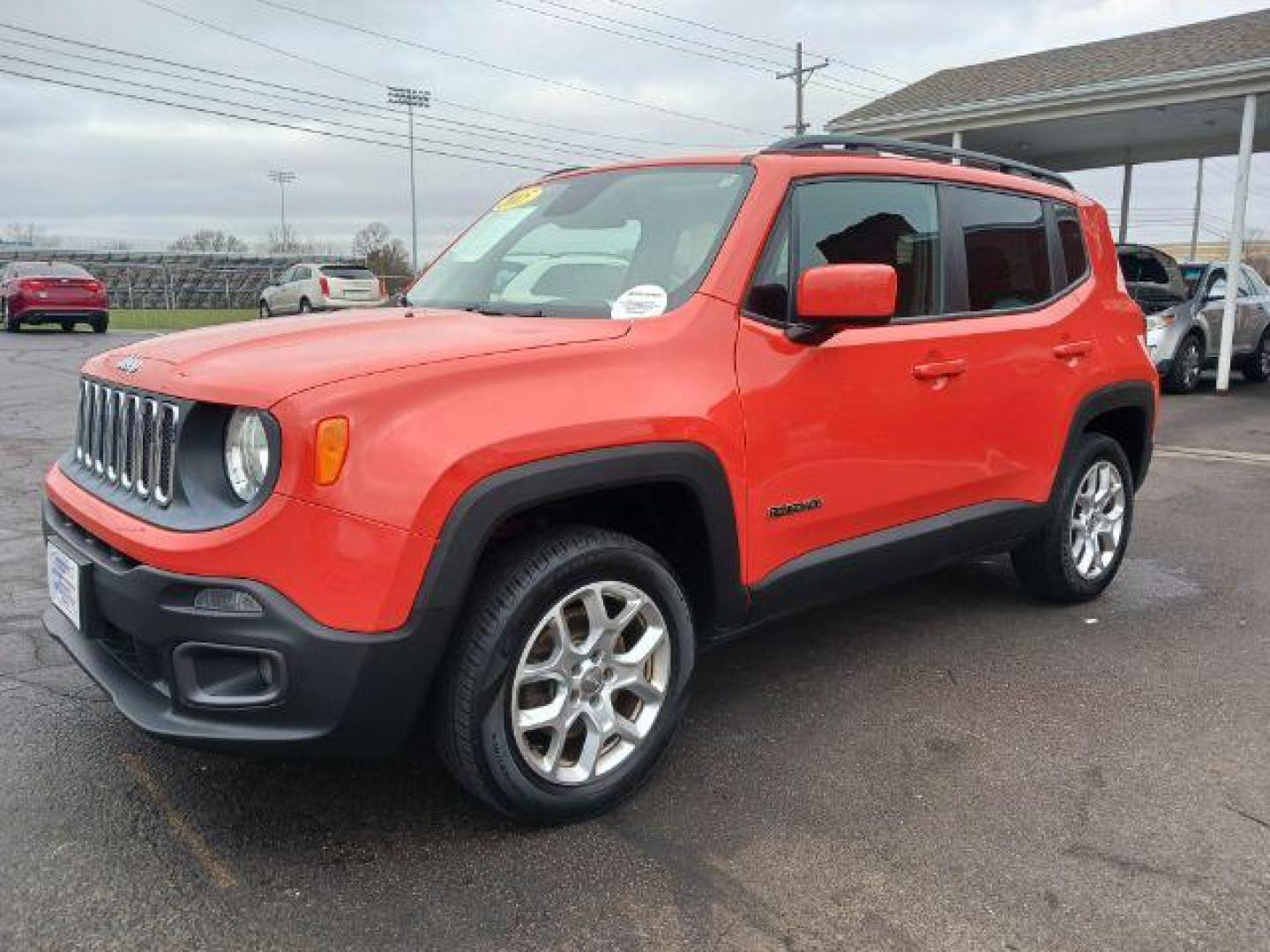 2015 Omaha Orange Jeep Renegade Latitude 4WD (ZACCJBBT1FP) with an 2.4L L4 DOHC 16V engine, 6-Speed Manual transmission, located at 401 Woodman Dr, Riverside, OH, 45431, (937) 908-9800, 39.760899, -84.123421 - Photo#2