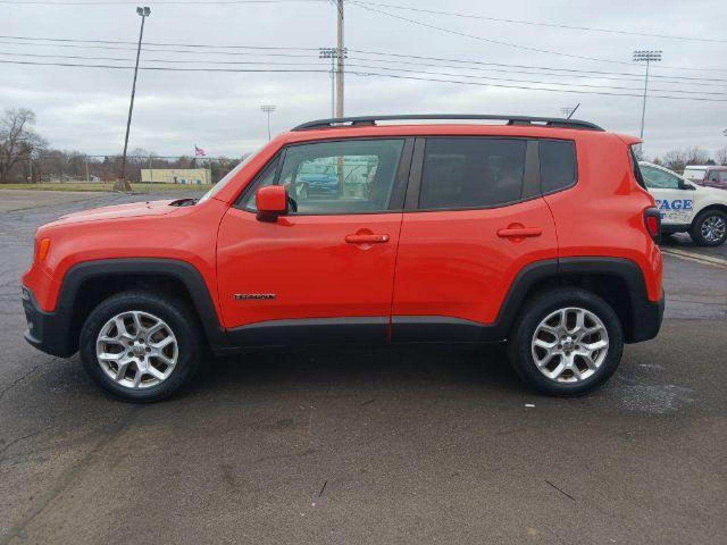 2015 Omaha Orange Jeep Renegade Latitude 4WD (ZACCJBBT1FP) with an 2.4L L4 DOHC 16V engine, 6-Speed Manual transmission, located at 401 Woodman Dr, Riverside, OH, 45431, (937) 908-9800, 39.760899, -84.123421 - Photo#3