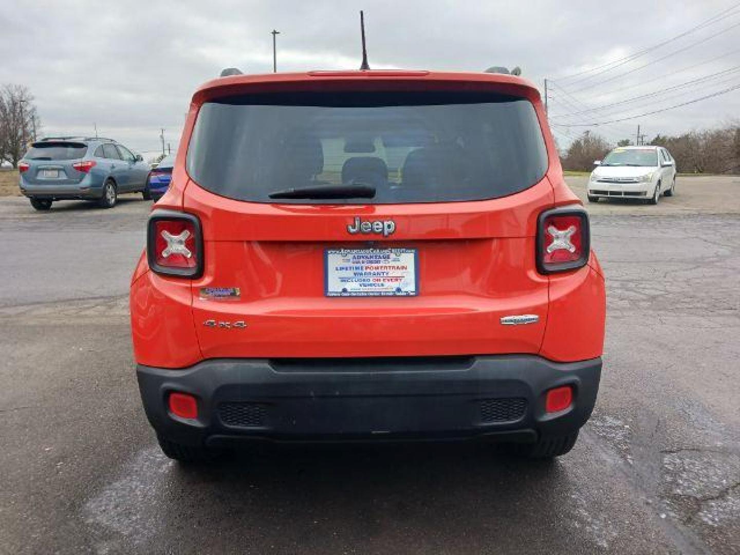 2015 Omaha Orange Jeep Renegade Latitude 4WD (ZACCJBBT1FP) with an 2.4L L4 DOHC 16V engine, 6-Speed Manual transmission, located at 401 Woodman Dr, Riverside, OH, 45431, (937) 908-9800, 39.760899, -84.123421 - Photo#5