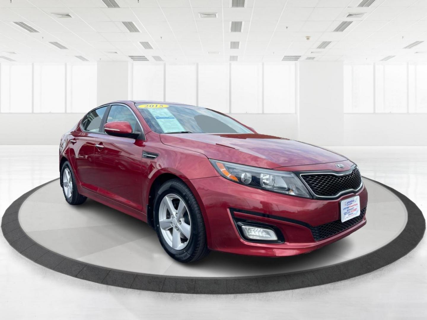 2015 Remington Red Metallic Kia Optima LX (5XXGM4A79FG) with an 2.4L L4 DOHC 16V engine, 6-Speed Automatic transmission, located at 4508 South Dixie Dr, Moraine, OH, 45439, (937) 908-9800, 39.689976, -84.218452 - Photo#0