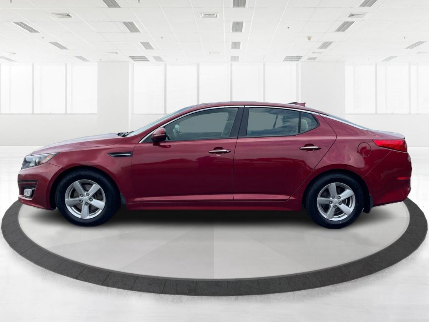 2015 Remington Red Metallic Kia Optima LX (5XXGM4A79FG) with an 2.4L L4 DOHC 16V engine, 6-Speed Automatic transmission, located at 4508 South Dixie Dr, Moraine, OH, 45439, (937) 908-9800, 39.689976, -84.218452 - Photo#5