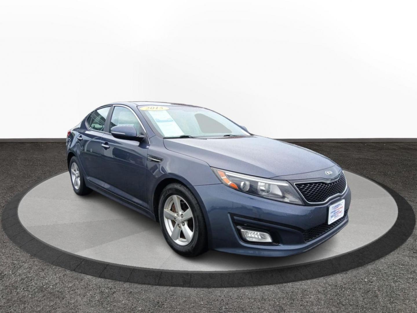 2015 Smokey Blue Kia Optima LX (KNAGM4A72F5) with an 2.4L L4 DOHC 16V engine, 6-Speed Automatic transmission, located at 1184 Kauffman Ave, Fairborn, OH, 45324, (937) 908-9800, 39.807072, -84.030914 - Photo#0