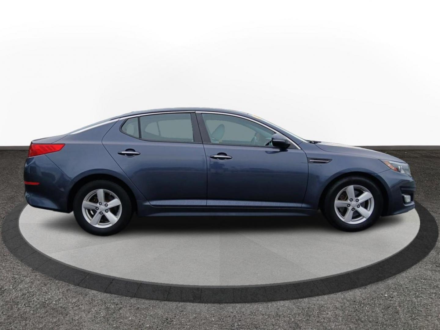 2015 Smokey Blue Kia Optima LX (KNAGM4A72F5) with an 2.4L L4 DOHC 16V engine, 6-Speed Automatic transmission, located at 1184 Kauffman Ave, Fairborn, OH, 45324, (937) 908-9800, 39.807072, -84.030914 - Photo#1