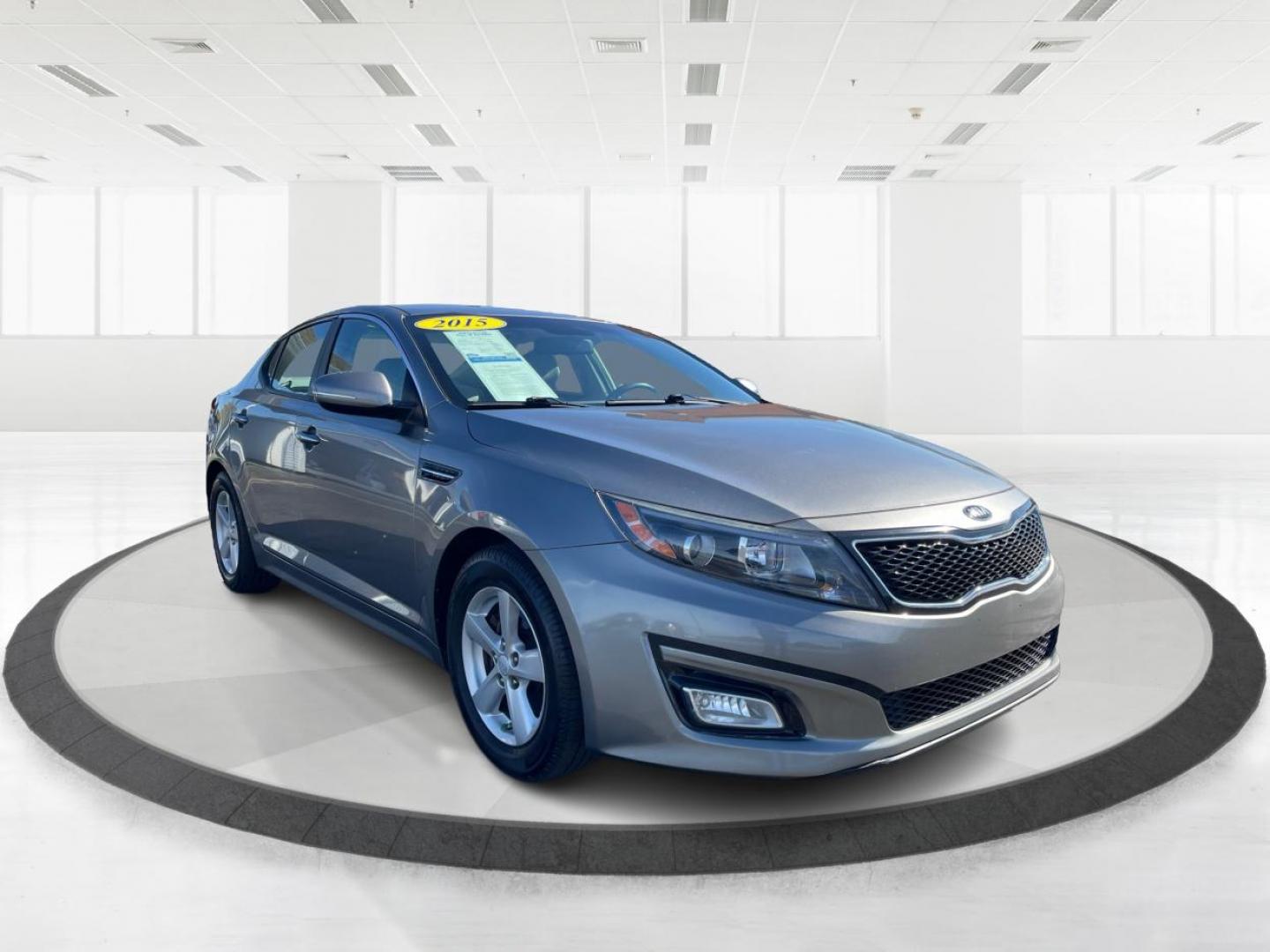 2015 Satin Metal Kia Optima (5XXGM4A7XFG) with an 2.4L L4 DOHC 16V engine, 6-Speed Automatic transmission, located at 4508 South Dixie Dr, Moraine, OH, 45439, (937) 908-9800, 39.689976, -84.218452 - Photo#0