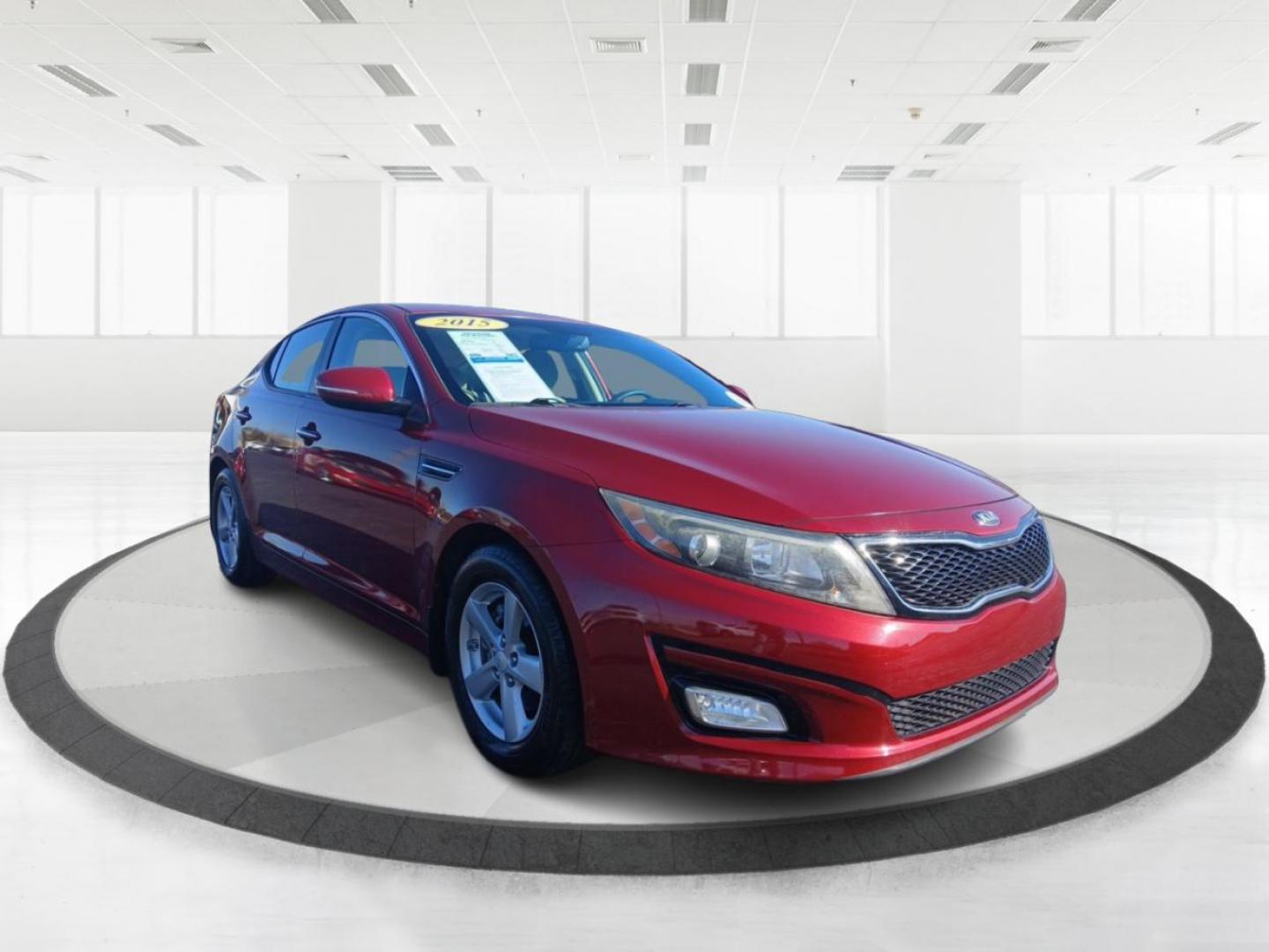 2015 Dark Cherry Kia Optima LX (5XXGM4A72FG) with an 2.4L L4 DOHC 16V engine, 6-Speed Automatic transmission, located at 8750 N County Rd 25A, Piqua, OH, 45356, (937) 908-9800, 40.164391, -84.232513 - Photo#0