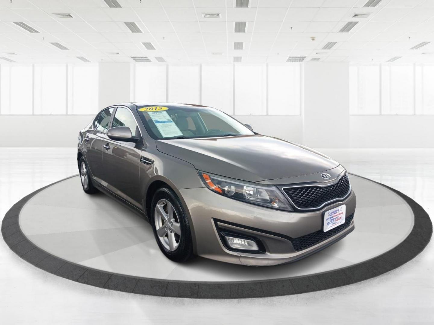 2015 Satin Metal Kia Optima (5XXGM4A77FG) with an 2.4L L4 DOHC 16V engine, 6-Speed Automatic transmission, located at 401 Woodman Dr, Riverside, OH, 45431, (937) 908-9800, 39.760899, -84.123421 - Photo#0