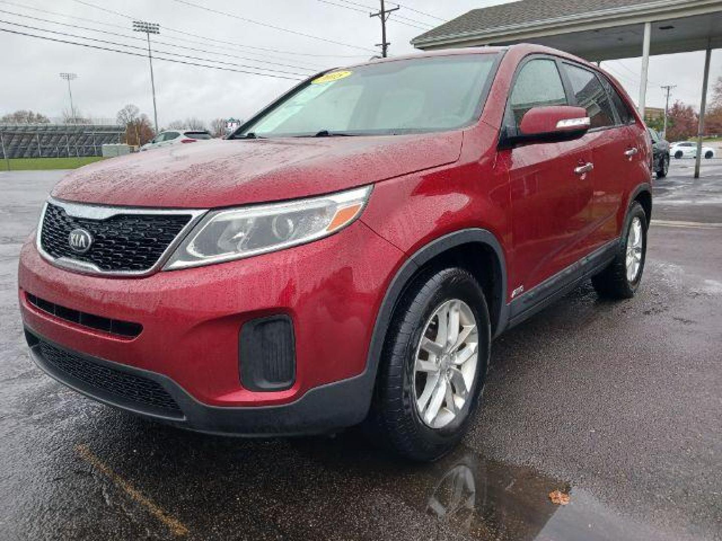 2015 Remington Red Metallic Kia Sorento LX AWD (5XYKTCA66FG) with an 2.4L L4 DOHC 16V engine, 6-Speed Automatic transmission, located at 1230 East Main St, Xenia, OH, 45385, (937) 908-9800, 39.688026, -83.910172 - Photo#2