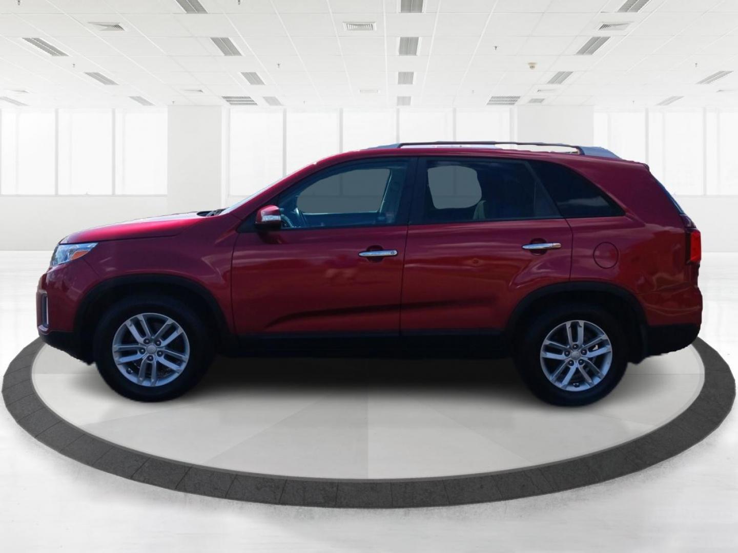 2015 Remington Red Metallic Kia Sorento (5XYKT4A65FG) with an 2.4L L4 DOHC 16V engine, 6-Speed Automatic transmission, located at 4508 South Dixie Dr, Moraine, OH, 45439, (937) 908-9800, 39.689976, -84.218452 - Photo#5