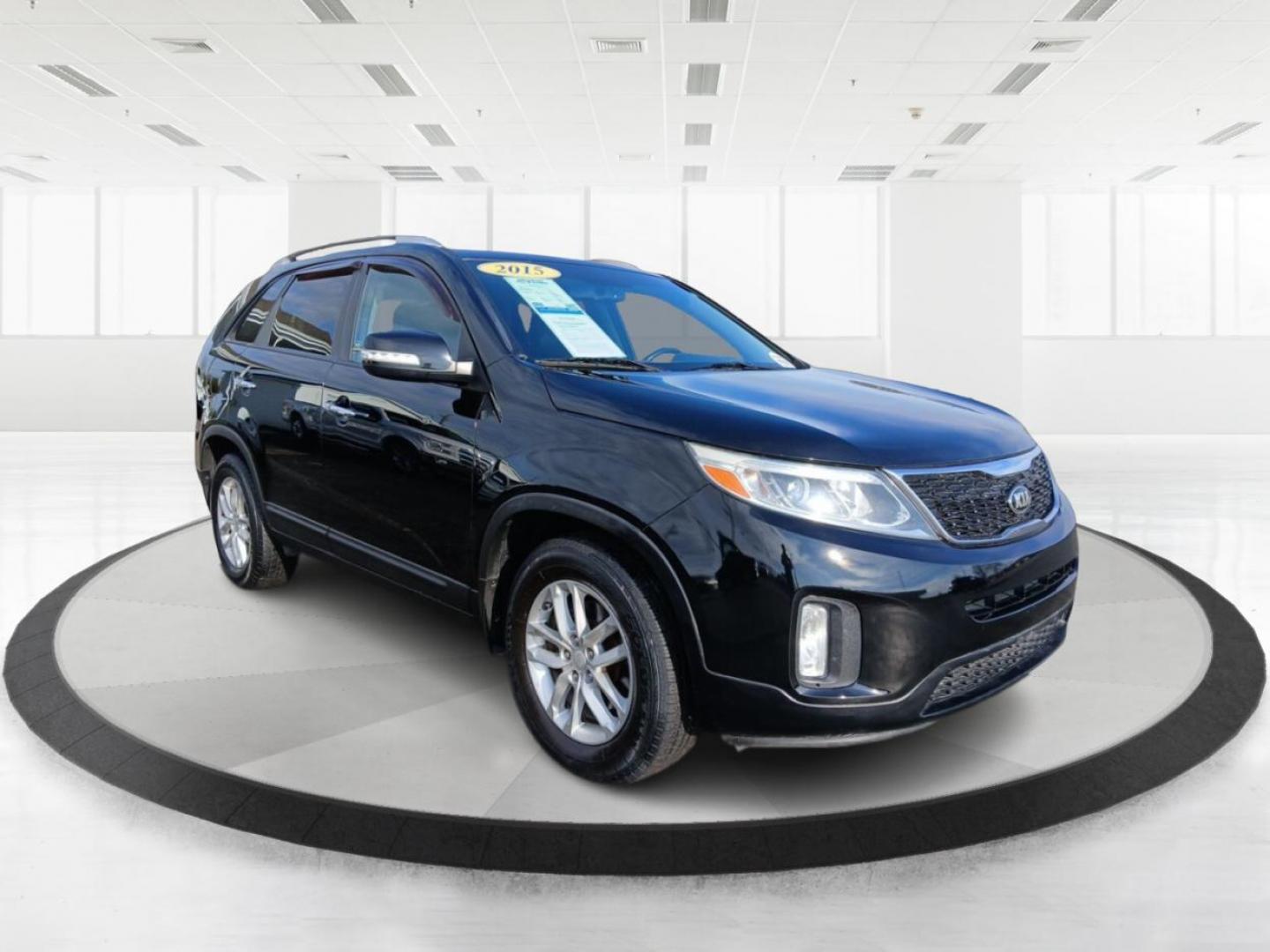 2015 Ebony Black Kia Sorento LX 2WD (5XYKT3A62FG) with an 2.4L L4 DOHC 16V engine, 6-Speed Automatic transmission, located at 401 Woodman Dr, Riverside, OH, 45431, (937) 908-9800, 39.760899, -84.123421 - 2015 Kia Sorento LX 2WD - Photo#0