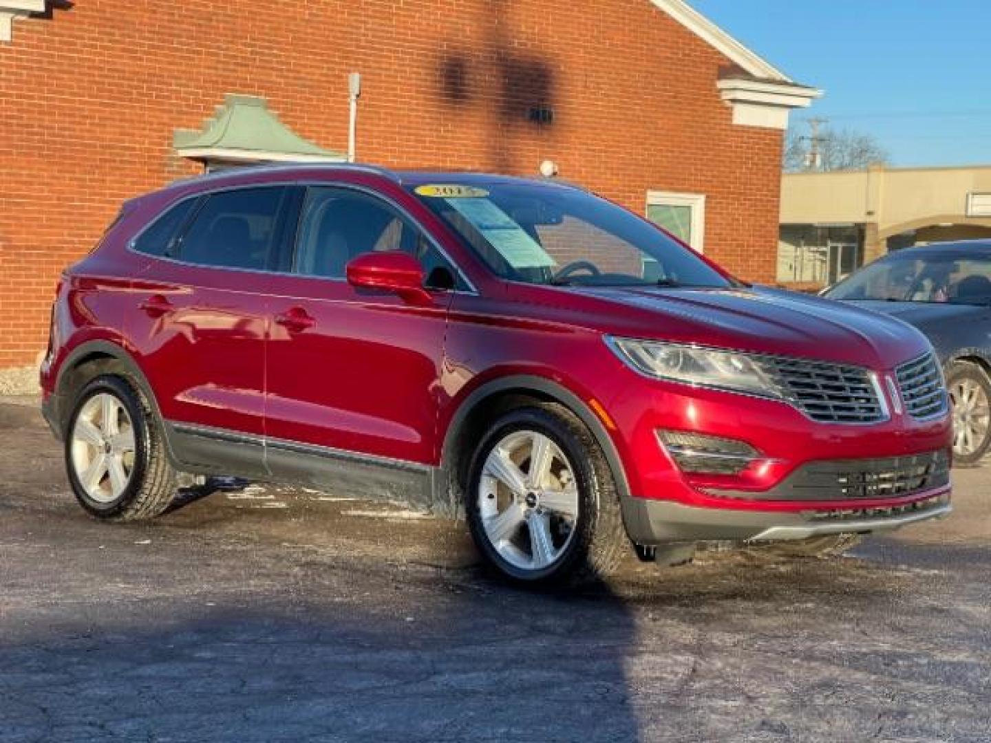 2015 Ruby Red Met Tinted CC Lincoln MKC AWD (5LMCJ2A94FU) with an 2.0L L4 DOHC 16V engine, 6-Speed Automatic transmission, located at 880 E. National Road, Vandalia, OH, 45377, (937) 908-9800, 39.891918, -84.183594 - Photo#0