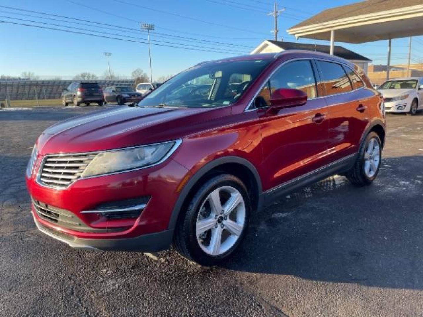 2015 Ruby Red Met Tinted CC Lincoln MKC AWD (5LMCJ2A94FU) with an 2.0L L4 DOHC 16V engine, 6-Speed Automatic transmission, located at 880 E. National Road, Vandalia, OH, 45377, (937) 908-9800, 39.891918, -84.183594 - Photo#1