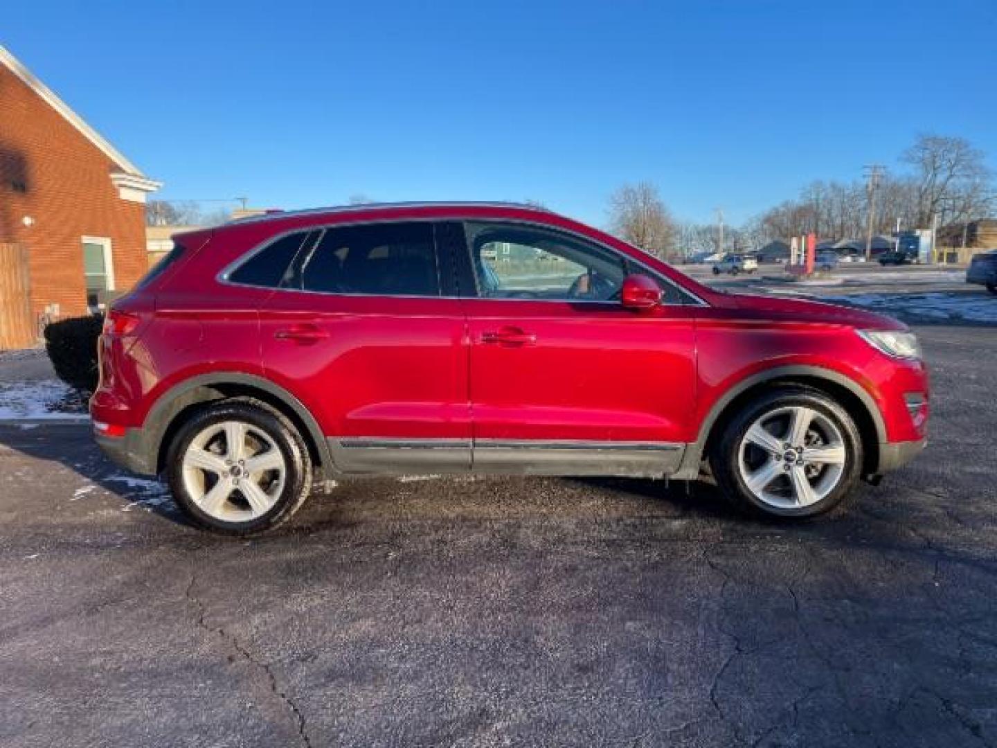 2015 Ruby Red Met Tinted CC Lincoln MKC AWD (5LMCJ2A94FU) with an 2.0L L4 DOHC 16V engine, 6-Speed Automatic transmission, located at 880 E. National Road, Vandalia, OH, 45377, (937) 908-9800, 39.891918, -84.183594 - Photo#5