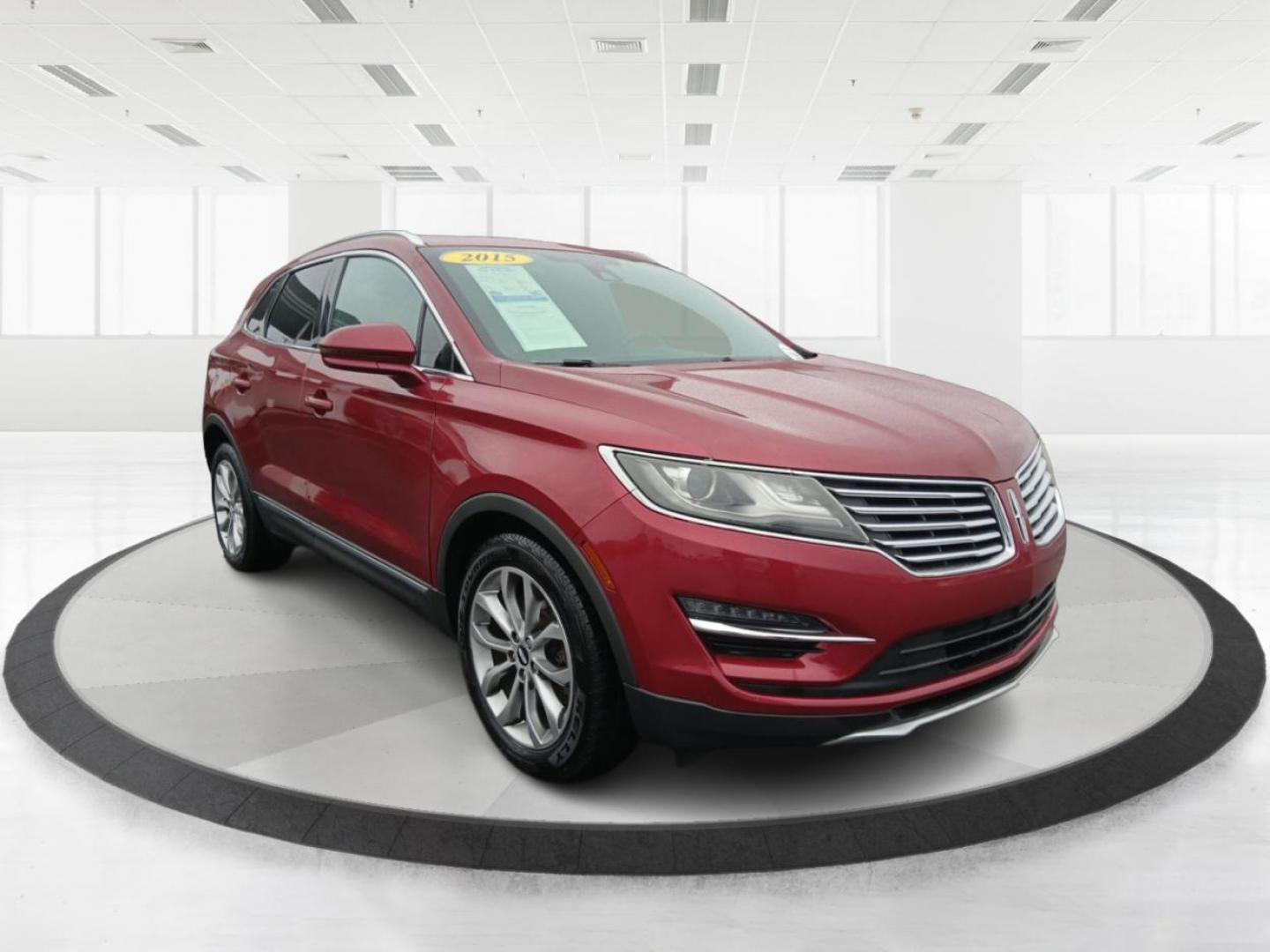 2015 Ruby Red Met Tinted CC Lincoln MKC AWD (5LMCJ2A9XFU) with an 2.0L L4 DOHC 16V engine, 6-Speed Automatic transmission, located at 8750 N County Rd 25A, Piqua, OH, 45356, (937) 908-9800, 40.164391, -84.232513 - Photo#0