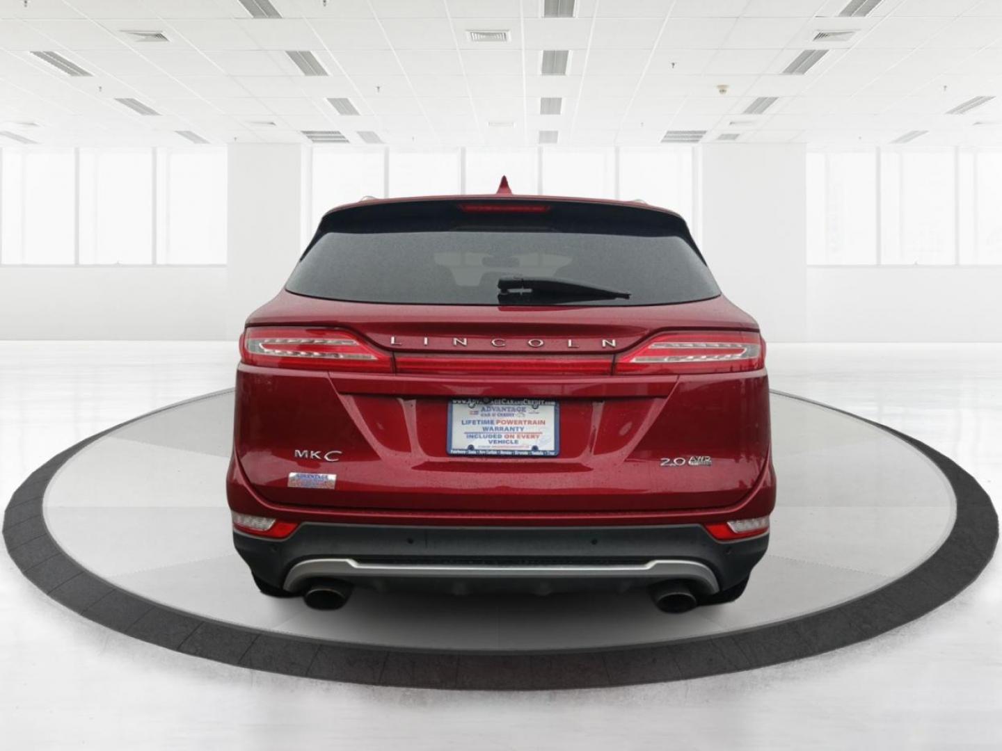 2015 Ruby Red Met Tinted CC Lincoln MKC AWD (5LMCJ2A9XFU) with an 2.0L L4 DOHC 16V engine, 6-Speed Automatic transmission, located at 8750 N County Rd 25A, Piqua, OH, 45356, (937) 908-9800, 40.164391, -84.232513 - Photo#3