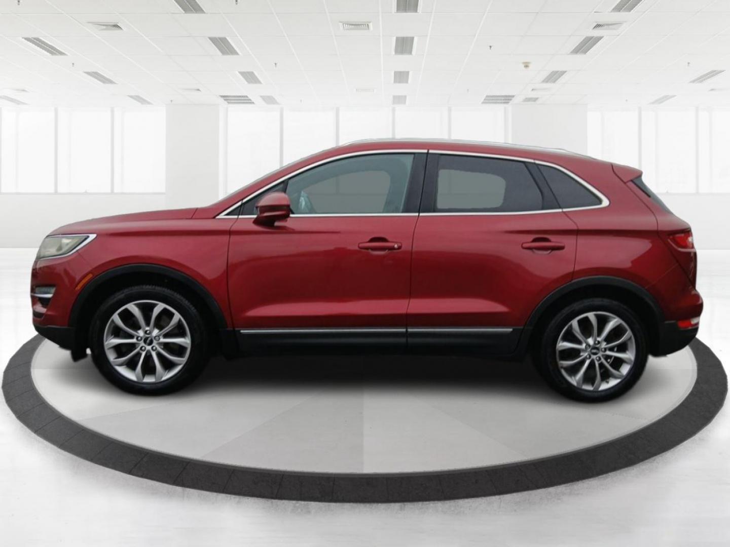 2015 Ruby Red Met Tinted CC Lincoln MKC AWD (5LMCJ2A9XFU) with an 2.0L L4 DOHC 16V engine, 6-Speed Automatic transmission, located at 8750 N County Rd 25A, Piqua, OH, 45356, (937) 908-9800, 40.164391, -84.232513 - Photo#5