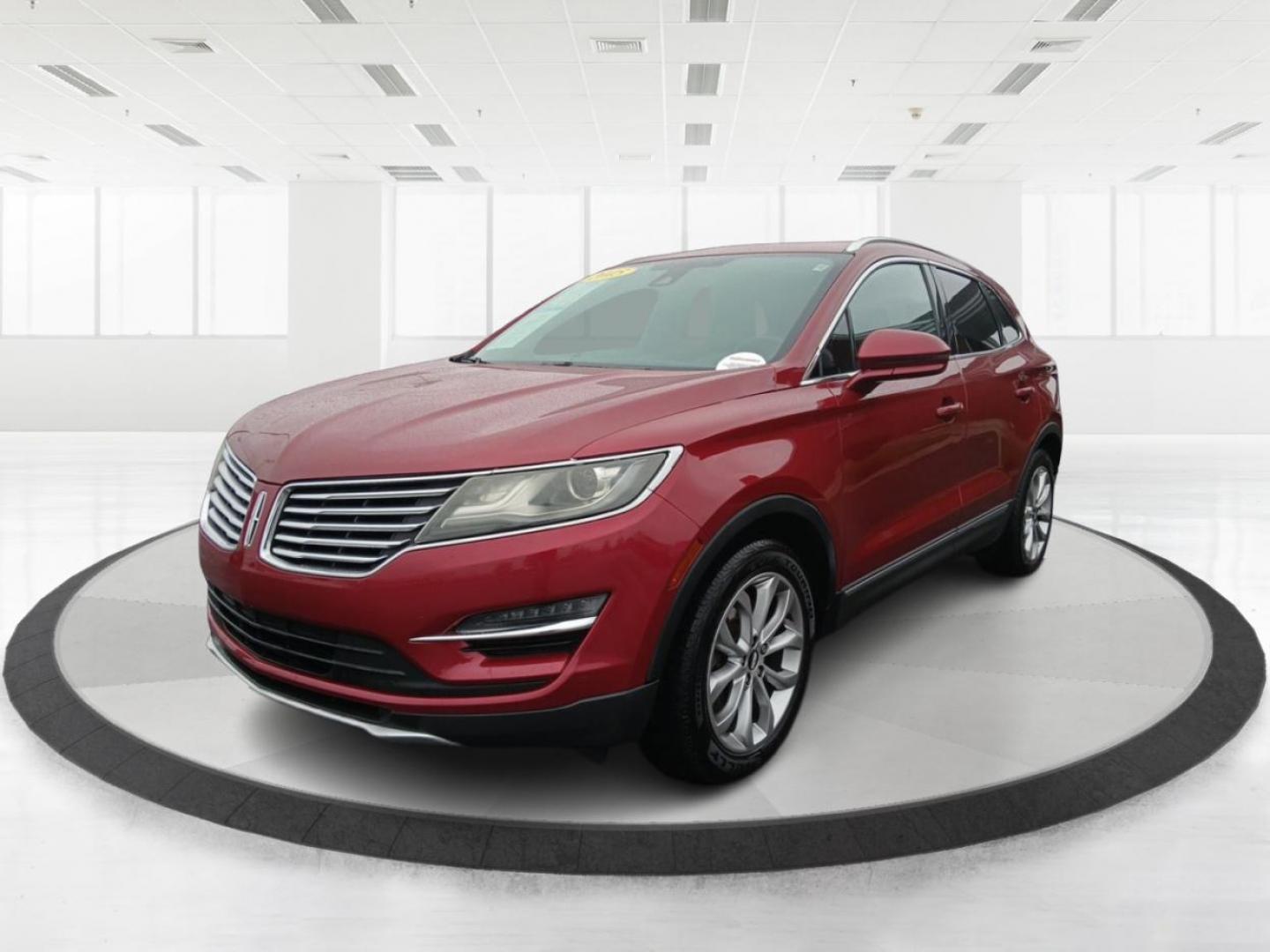 2015 Ruby Red Met Tinted CC Lincoln MKC AWD (5LMCJ2A9XFU) with an 2.0L L4 DOHC 16V engine, 6-Speed Automatic transmission, located at 8750 N County Rd 25A, Piqua, OH, 45356, (937) 908-9800, 40.164391, -84.232513 - Photo#7