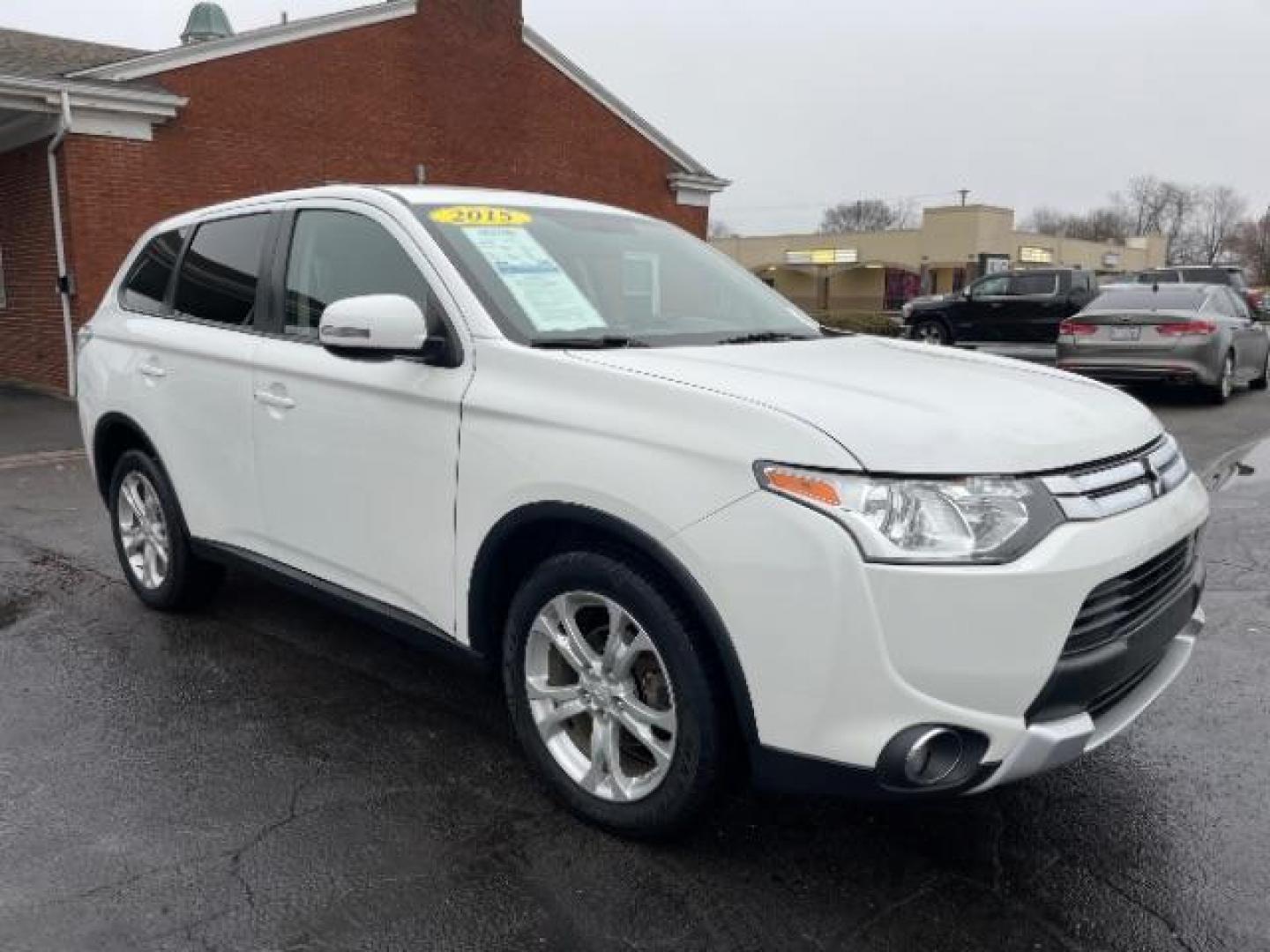 2015 Diamond White Mitsubishi Outlander SE S-AWC (JA4AZ3A33FZ) with an 2.4L L4 DOHC 16V engine, 6-Speed Automatic transmission, located at 1099 N County Rd 25A , Troy, OH, 45373, (937) 908-9800, 40.057079, -84.212883 - Photo#0