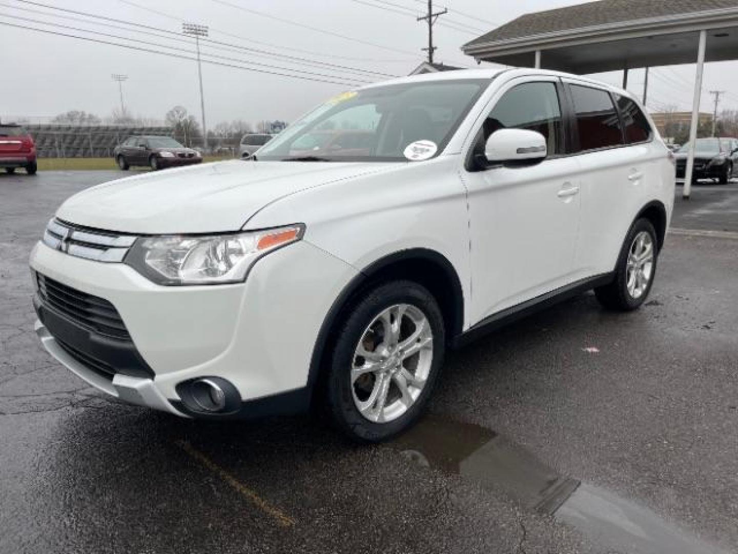 2015 Diamond White Mitsubishi Outlander SE S-AWC (JA4AZ3A33FZ) with an 2.4L L4 DOHC 16V engine, 6-Speed Automatic transmission, located at 1099 N County Rd 25A , Troy, OH, 45373, (937) 908-9800, 40.057079, -84.212883 - Photo#1